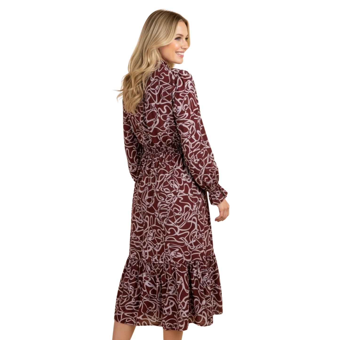 Embrace effortless elegance with this stunning Abstract Print Tiered Dress from Hemish USA. Crafted for the modern woman, this plus-size midi features long sleeves and an eye-catching abstract print that adds visual interest to any wardrobe. The smocked bodice provides comfortable support and flattering fit, while tiered layers create beautiful movement and dimension. Perfect for casual outings, work events, or weekend adventures. A versatile piece that celebrates individuality and style.
