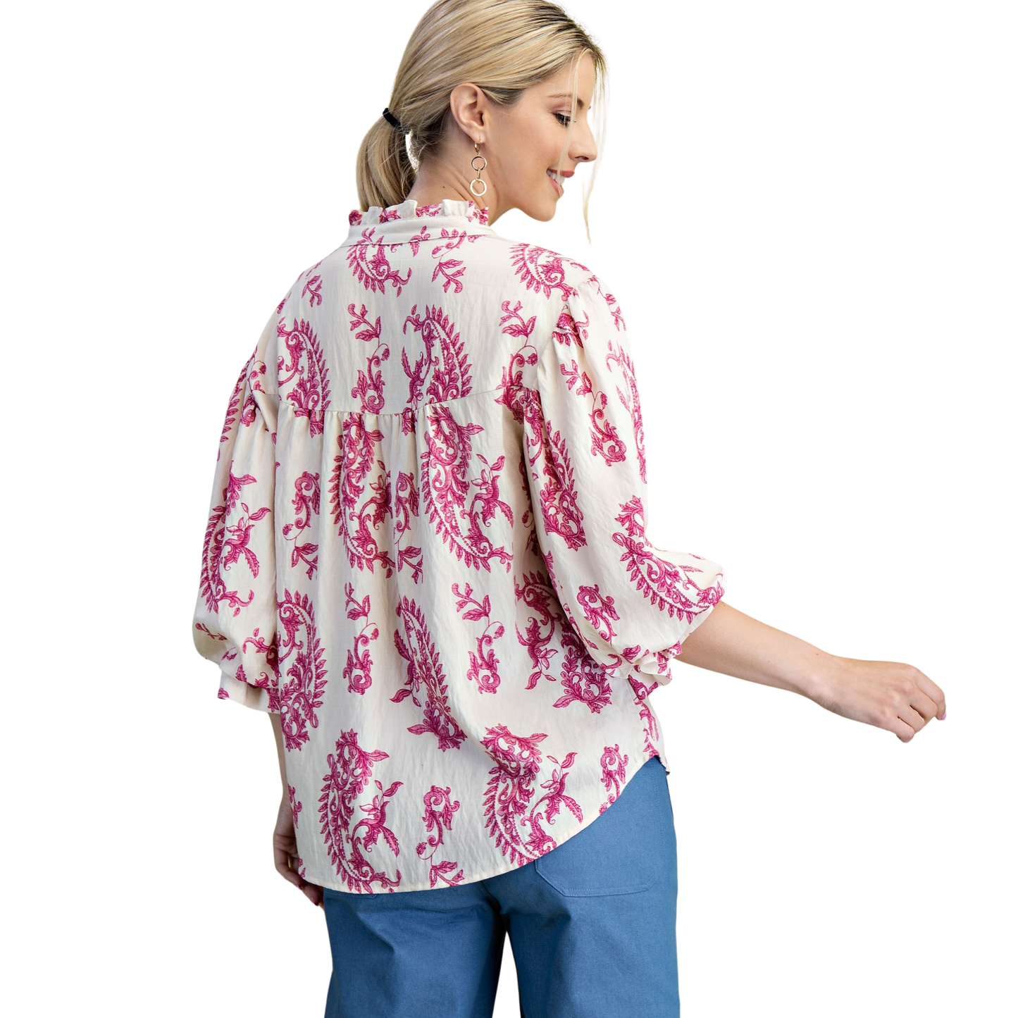 Elevate your wardrobe with this stunning Button Down Balloon Sleeve Top from GiGio. Featuring a vibrant fuchsia base adorned with an eye-catching abstract print, this piece brings artistic flair to everyday styling. The flattering 3/4 length balloon sleeves add dimension and movement, while the classic button-down front offers versatile layering options. Perfect for transitional seasons, pair it with your favorite jeans or trousers for an effortlessly chic look that stands out.