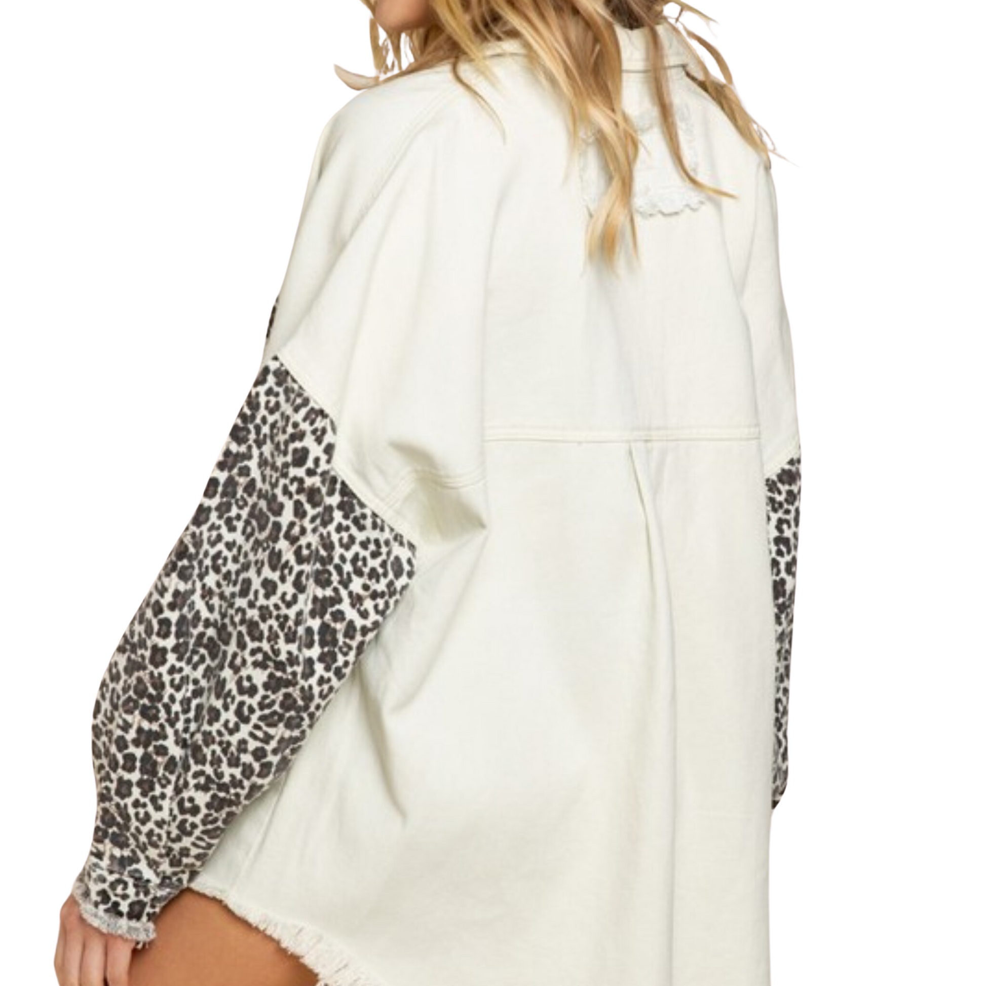 This stylish Animal Print Denim Jacket will make a statement. With animal print sleeves and a cream-colored denim body, this lightweight jacket is perfect for any season. Show off your style with this timeless and classic design.