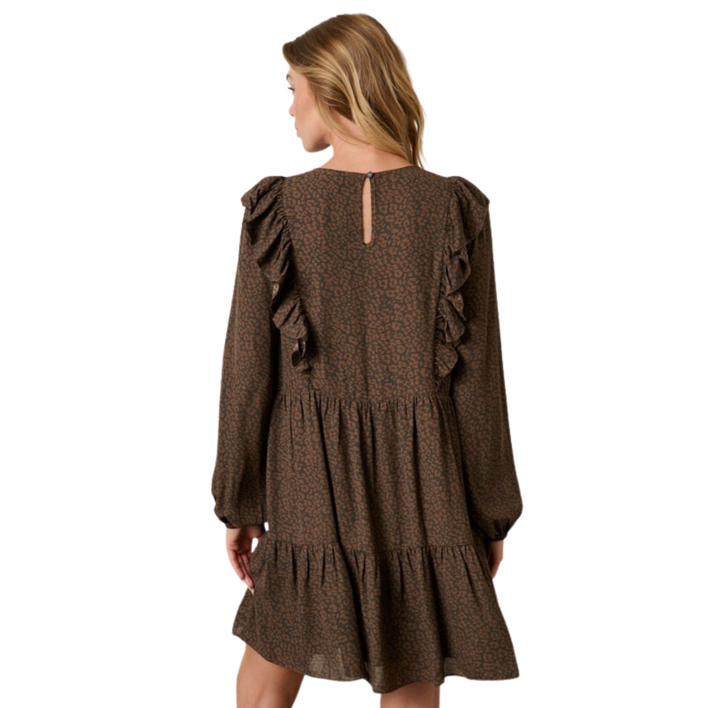 Look chic and sophisticated in our Animal Print Mini Dress. Crafted from a luxurious woven fabric, this mocha-colored beauty features a round neck, keyhole back with button closure, and ruffle detail for added elegance. The long sleeve design ensures you stay comfortable and stylish.