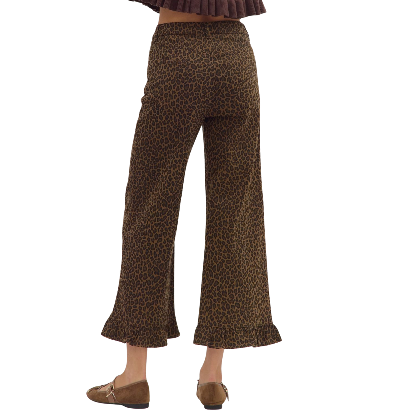 These cropped wide-leg pants from Entro fuse bold animal print with a sophisticated brown palette, creating a striking statement piece. The ruffle hem adds delicate movement and an elevated feminine touch, while the high-quality fabric ensures comfort and durability. Perfect for styling with both casual and dressy tops, they offer versatile wear for a confident, fashion-forward look.