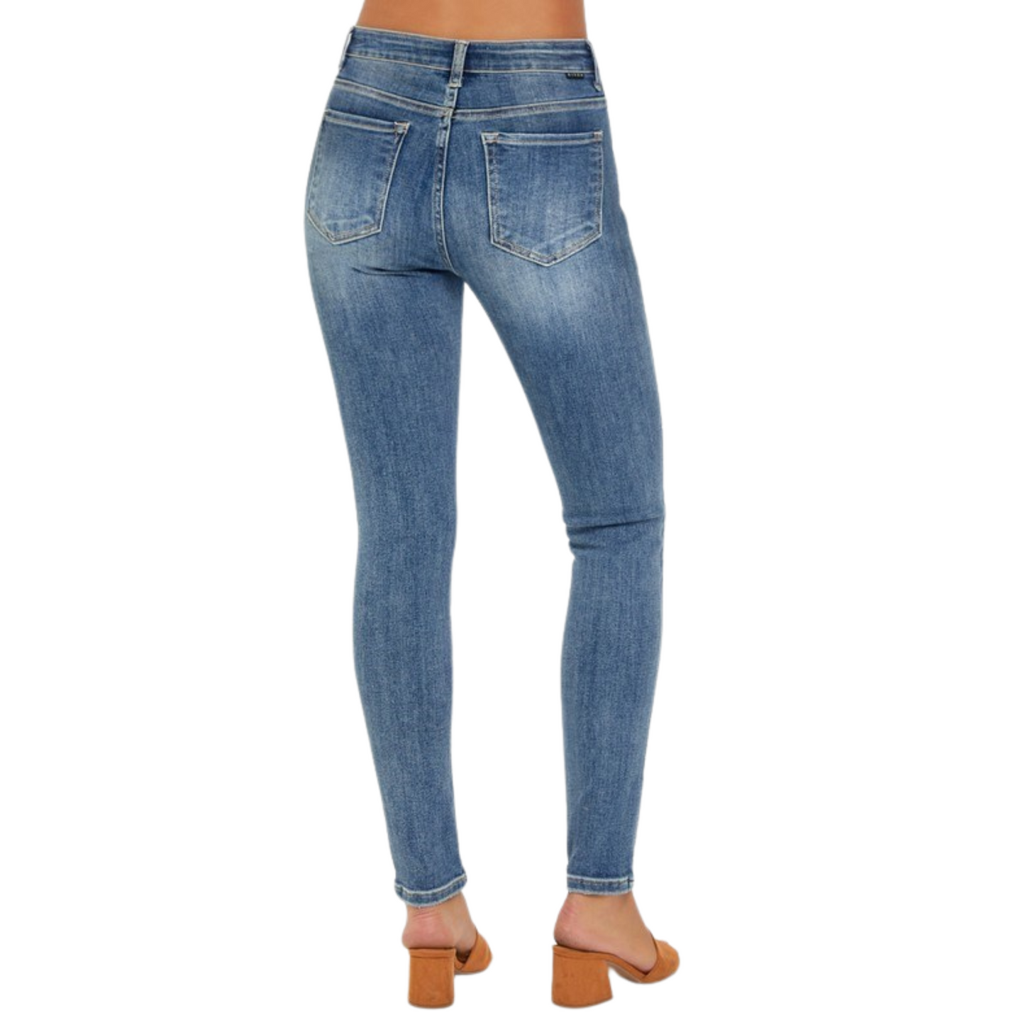 These Mid Rise Ankle Skinny Jeans by Risen offer a dark wash and a sleek skinny fit, perfect for a modern and versatile look. The mid-rise waist provides comfort and coverage, while the quality of the Risen brand ensures durability. Upgrade your wardrobe with these chic and flattering jeans.