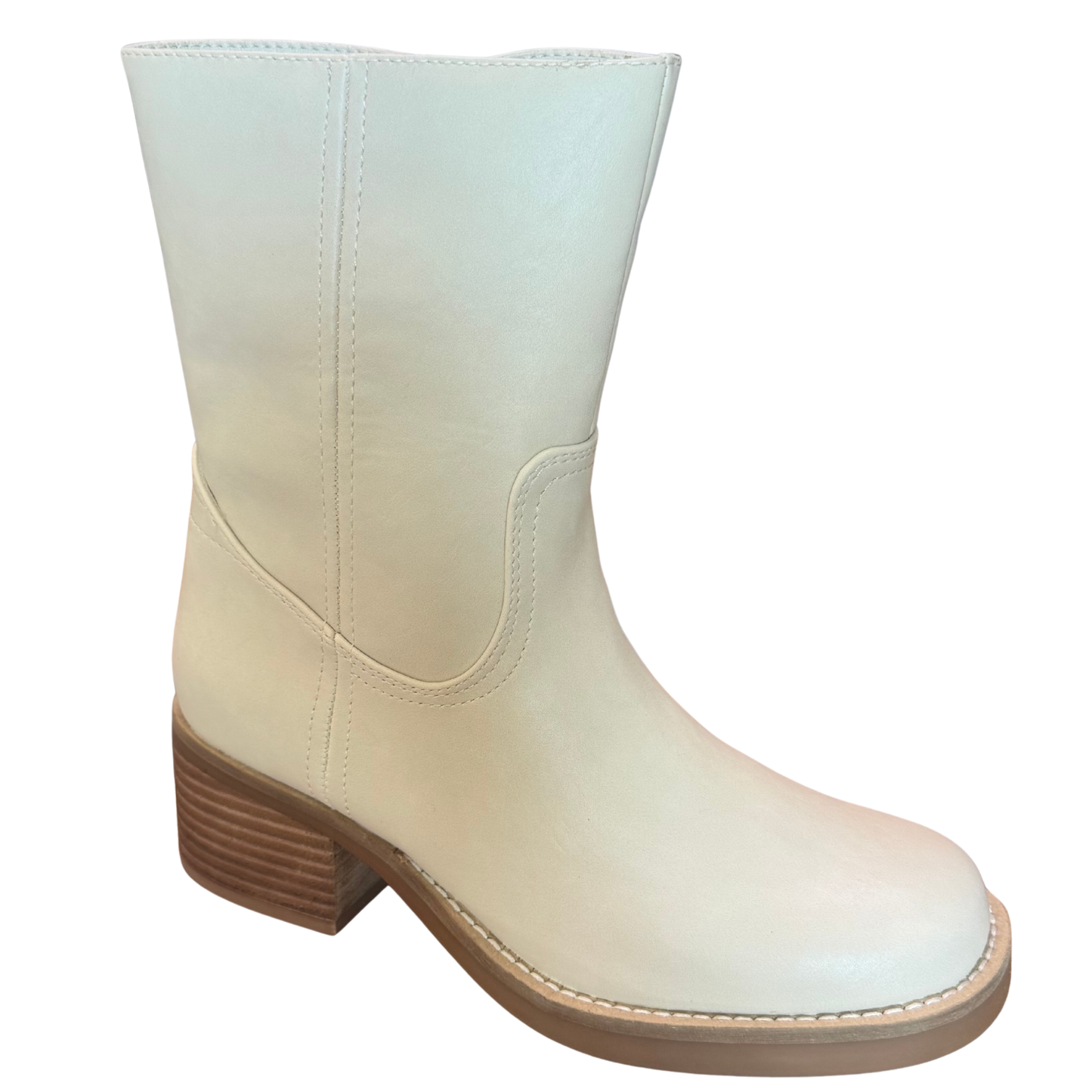 The Augustin bootie heel from Mia brings effortless elegance to your everyday rotation. Crafted in a versatile cream color, this style pairs seamlessly with dresses, jeans, or trousers. The classic bootie silhouette offers comfort and support while adding a polished touch to any outfit. A must-have for transitional seasons and year-round styling.