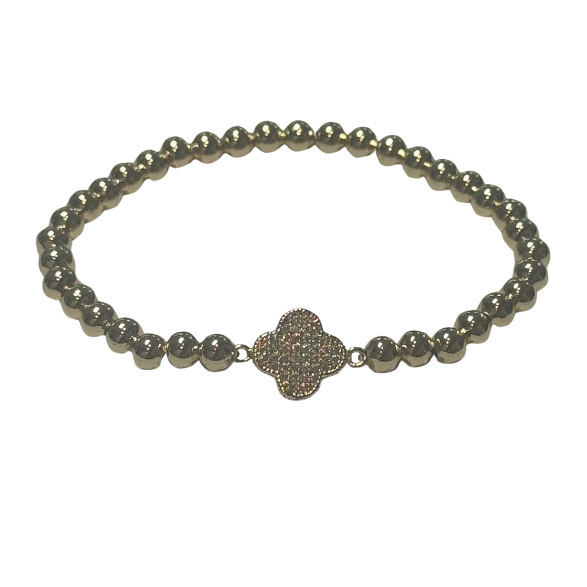 This elegant gold-toned stretchy bracelet features delicate beaded detailing and a distinctive clover accent, subtly embellished with sparkling rhinestones. Designed for a comfortable fit, it effortlessly combines style and versatility, making it an expert choice for adding a refined touch to any outfit.