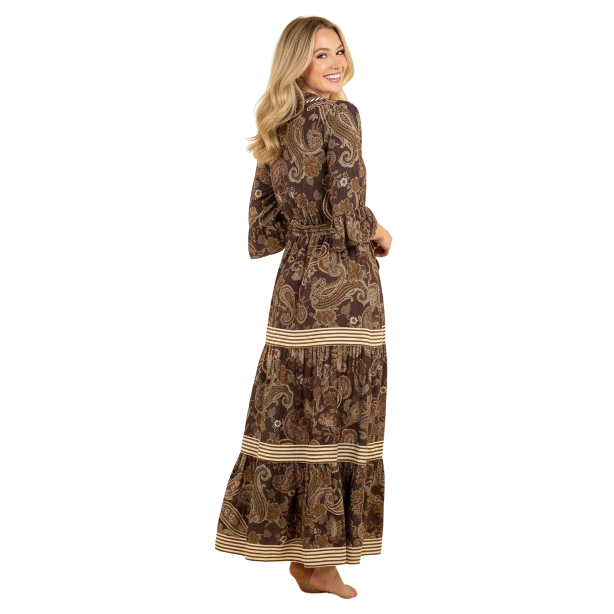 Elegant brown paisley print maxi dress from Hemish brand. Features a flattering v-neck neckline, long sleeves, and a defined belted waist that accentuates your silhouette. The tiered design adds movement and dimension for a sophisticated, body-conscious look. Perfect for elevated everyday wear or special occasions.