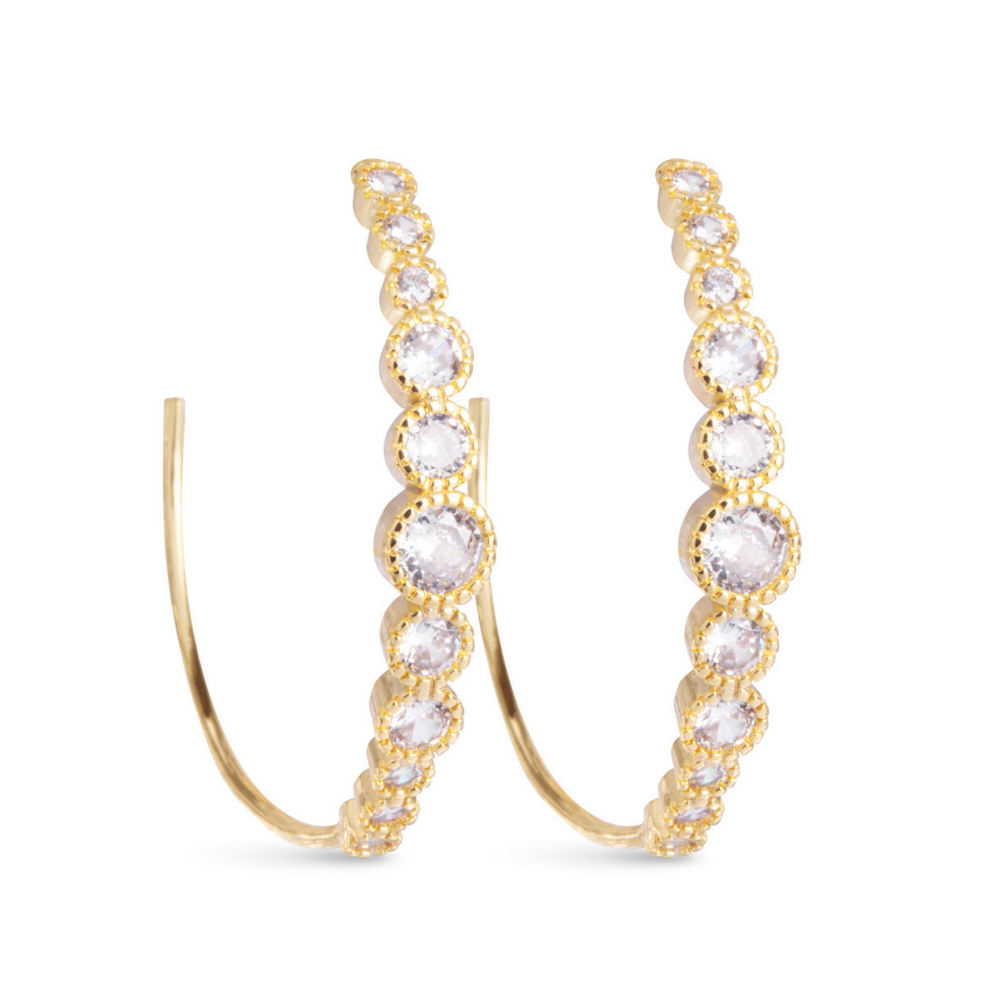 Crafted by the expert jewelers at Amanda Blu, these Graduated Bezel Set Hoop Earrings are a must-have addition to your jewelry collection. Made from gold with stunning rhinestone accents, these hoop earrings will add a touch of elegance and glamour to any outfit. Perfect for any occasion, these earrings are versatile and timeless.