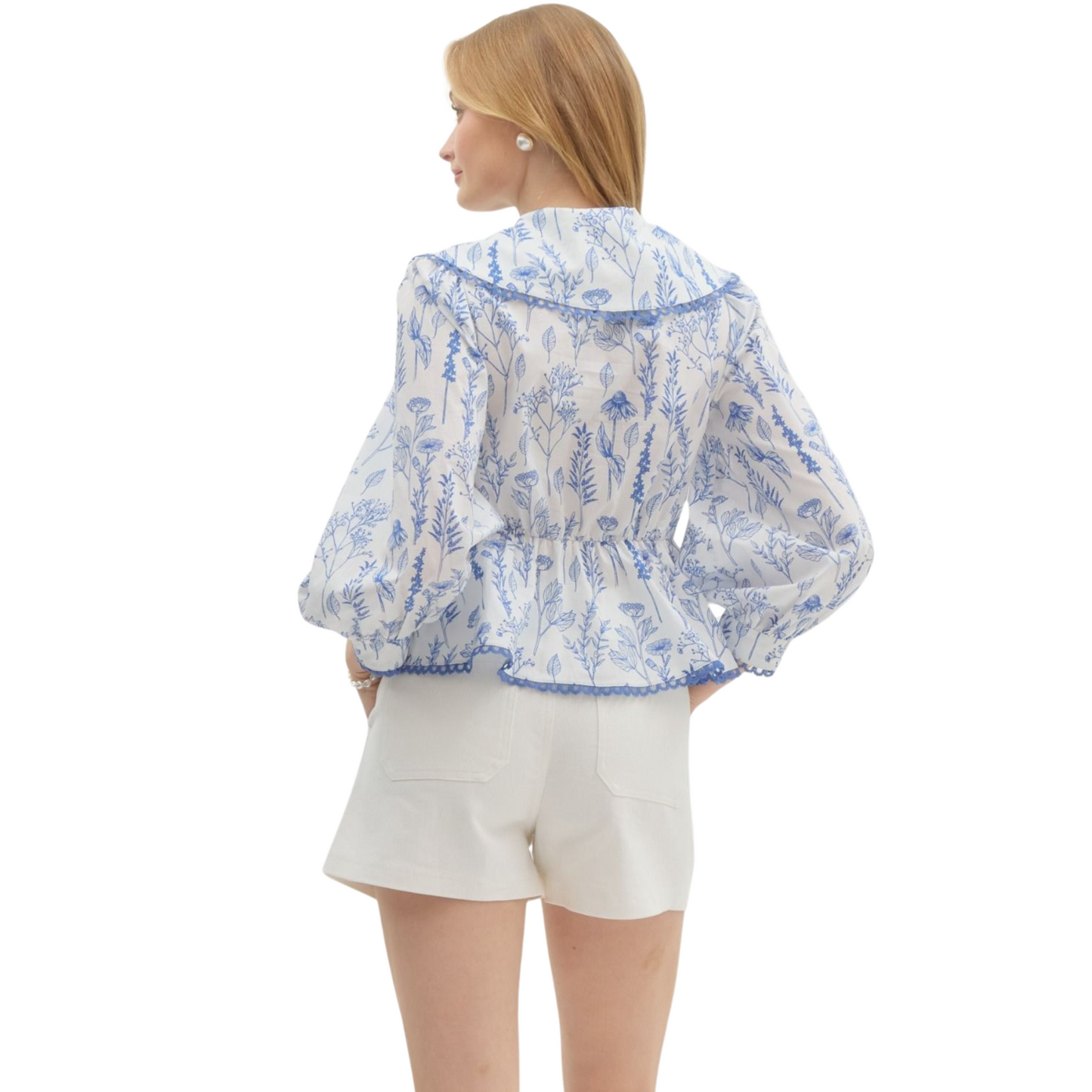 Expertly crafted and designed for comfort, the Floral Collared Babydoll Top from Entro features a stunning blue floral stencil print. With ¾ band cuff sleeves and a scallop trim finish, this pullover top effortlessly ties below an oversized collar and an elasticated back waist for a flattering fit. Made from lightweight, non-sheer woven fabric, this top is perfect for any occasion.