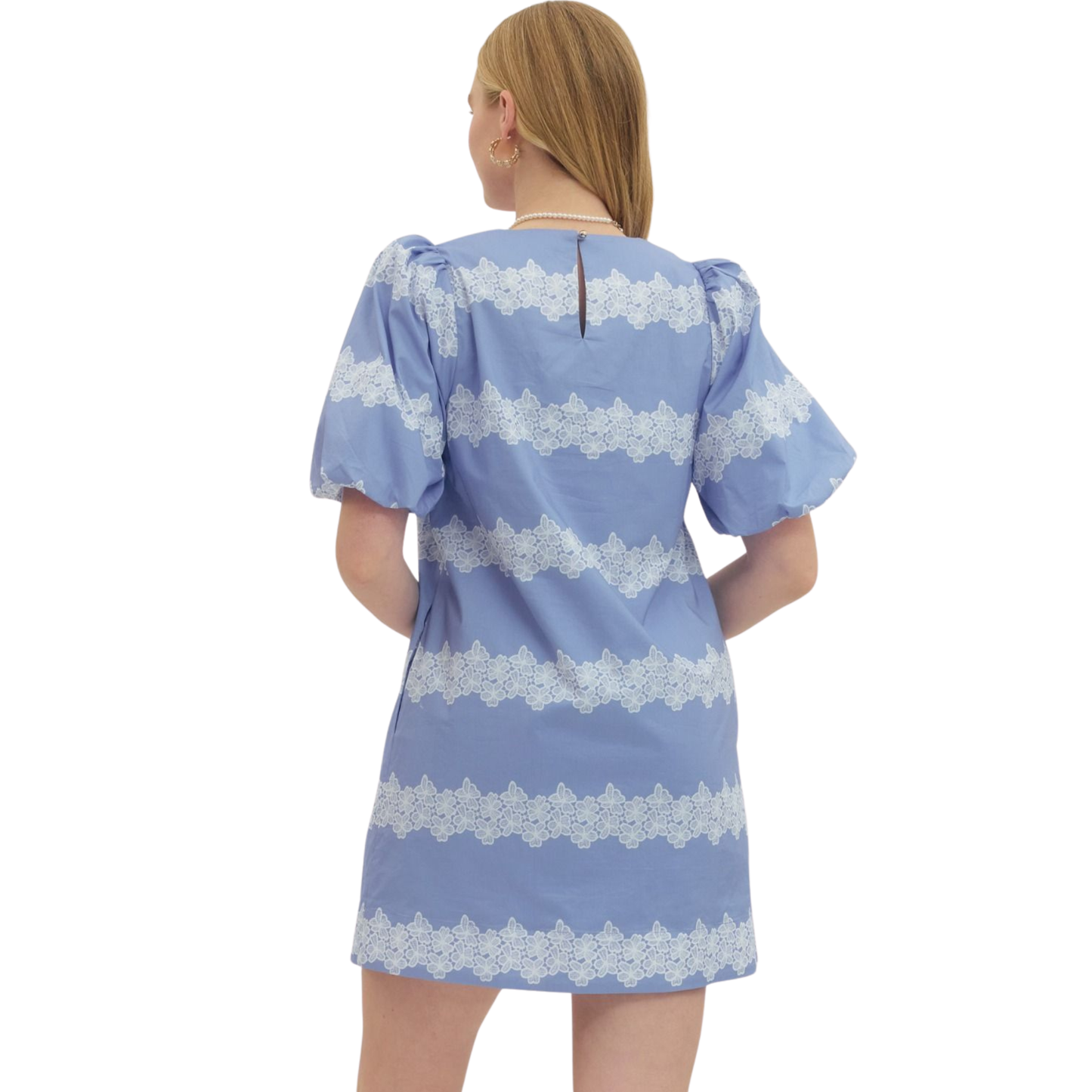 Elevate your wardrobe with this charming Entro puff sleeve mini dress, featuring a delicate blue floral print that brings effortless elegance to any occasion. The short puffed sleeves add a playful, feminine touch while the mini silhouette keeps things fresh and modern. Perfect for spring outings, casual dates, or weekend adventures. This dress combines comfort with style, making it an easy go-to piece for creating memorable looks.