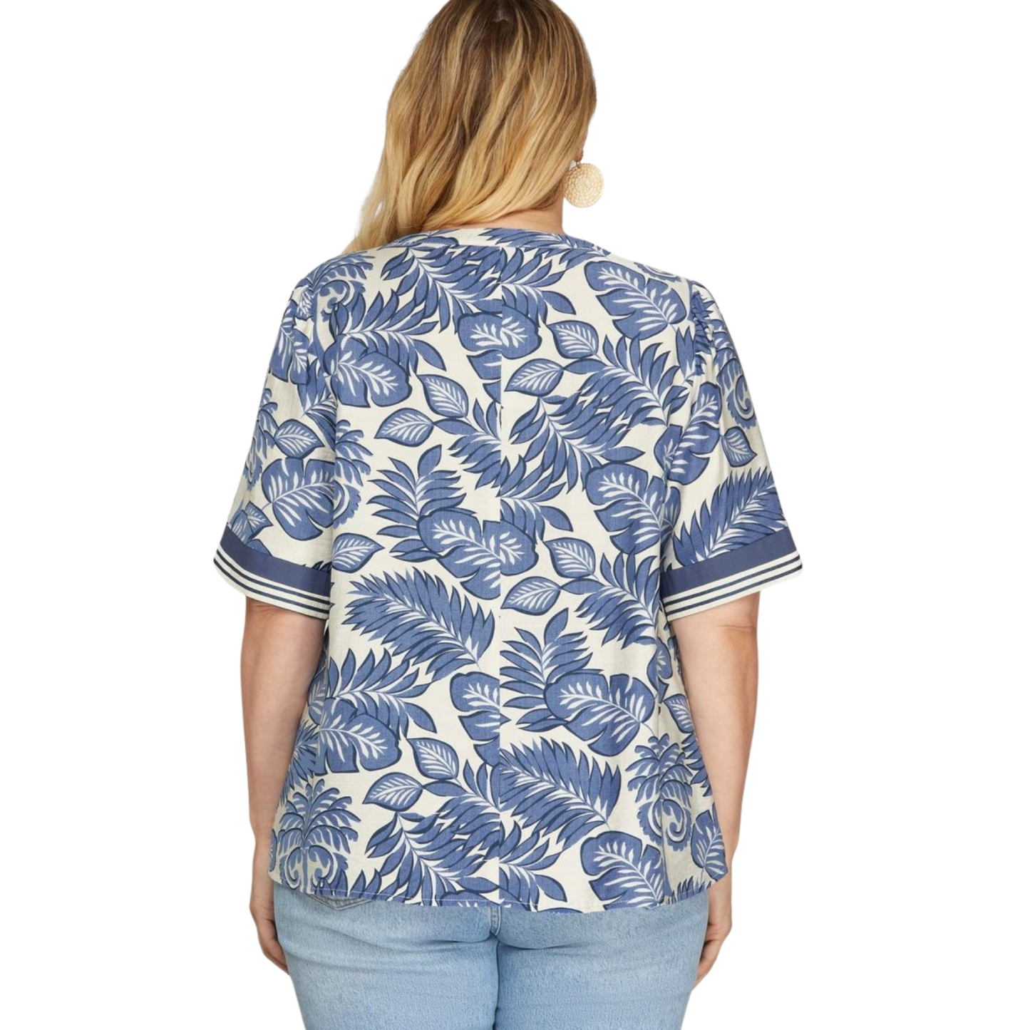 Elevate your everyday wardrobe with this stunning Woven Print Top from She+Sky. Featuring a serene botanical print in rich blue tones, this piece brings natural elegance to any outfit. The flattering V-neckline creates a refined silhouette while the quality woven fabric ensures comfort and durability. Perfect for layering or wearing solo, this versatile top transitions seamlessly from casual days to dressed-up occasions.
