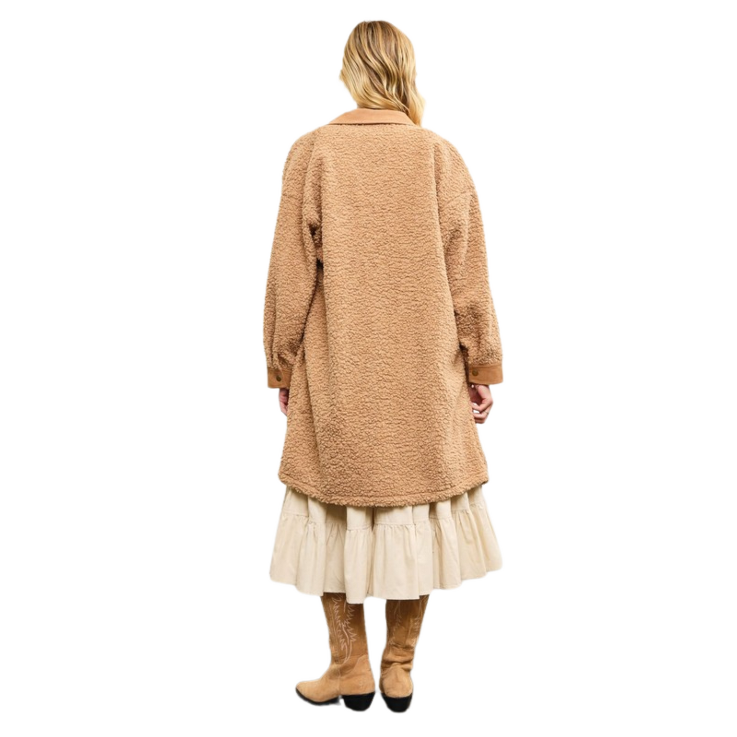 This Boucle Textured Jacket by Mustard Seed features a sophisticated latte color, button-up closure, and practical pockets. Its textured design adds a touch of elegance to any outfit. Stay warm and stylish this season with this expertly crafted jacket.