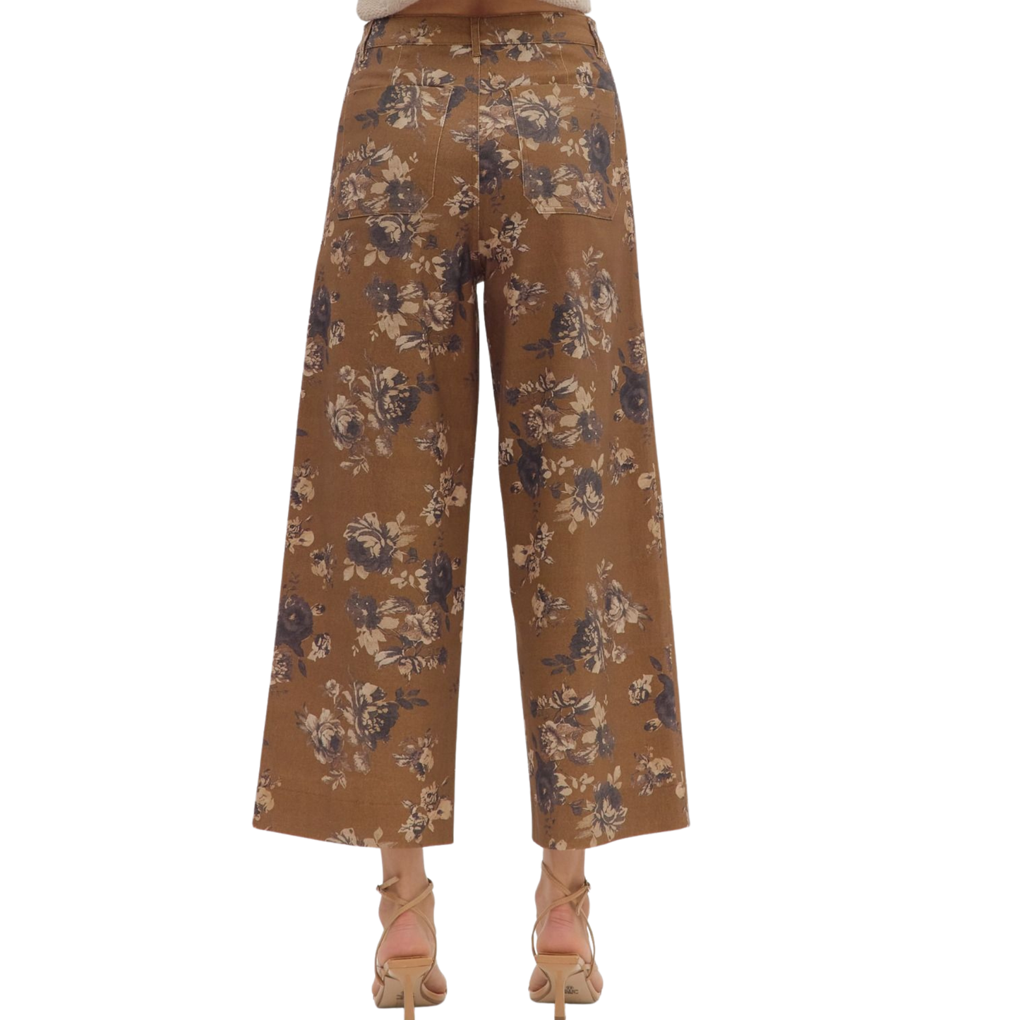 These mid-rise ankle-length pants by Entro feature a delicate floral pattern on a lightweight, woven fabric that ensures comfort without transparency. Designed with a button and zip-fly closure, they offer a secure fit complemented by practical patch pockets at both front and back. Their unlined construction maintains breathability, making them ideal for warm weather while retaining a polished, expert look. Perfect for those seeking stylish, versatile pants with attention to detail.