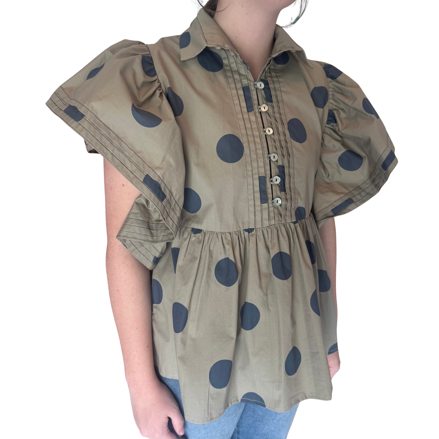 This taupe Polka Dot Top by Bucket List is perfect for any occasion. The timeless polka dot design adds a touch of playfulness, while the convenient lightweight material offers functionality. Stay stylish and organized with this must-have addition to your wardrobe.