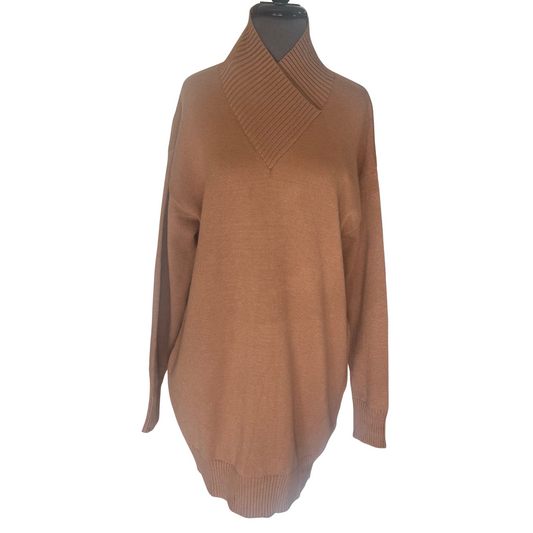 Elevate your wardrobe with the Heyson Mock Neck Sweater Dress in a rich cocoa color. This mini dress features long sleeves and a sleek mock neck, combining warmth with sophisticated style. Its form-fitting silhouette offers a flattering fit, perfect for layering or wearing solo during cooler seasons. Crafted to balance comfort and elegance, this dress is ideal for both casual and dressier occasions.