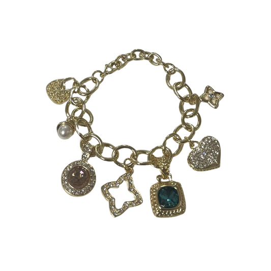 Expertly crafted in lustrous gold, this charm bracelet features elegant pearl, blue stone, and topaz accents. Finished with a secure clasp closure, it's the perfect accessory for adding a touch of sophistication to any outfit. Elevate your style with this exquisite bracelet.