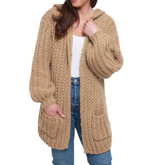 The Kyler Chunky Cardigan from Howard's brand features a large weave design in a versatile oatmeal color, offering both warmth and style. Its hooded construction adds an extra layer of comfort, making it perfect for layering during cooler days. Crafted to deliver a cozy yet breathable experience, this cardigan effortlessly combines practicality with a refined textured look.
