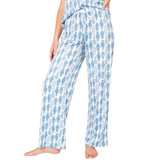 Experience ultimate comfort with the Claire Sleep Pants from The Royal Standard. Crafted in a soothing blue hue, these loungewear pants feature an adjustable drawstring for a personalized fit. Designed for relaxation and ease, they combine soft fabric with expert tailoring to support restful sleep and cozy downtime. Perfect for lounging at home or unwinding after a long day.