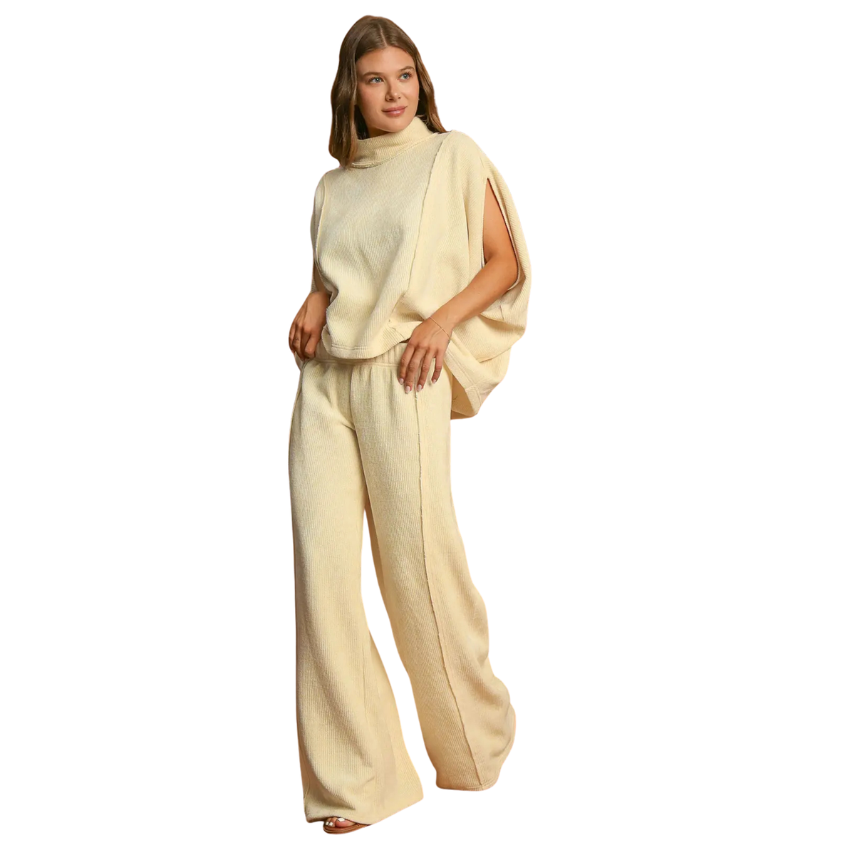 This Umgee cream coordinating set delivers understated sophistication with practical comfort. The matching top and bottom pairing streamlines your styling process while maintaining a polished aesthetic. An elastic waistband on the bottoms ensures all-day wearability without compromising fit. Crafted by Umgee, known for thoughtful construction and quality fabrics, this neutral ensemble serves as a reliable foundation for building versatile outfits.