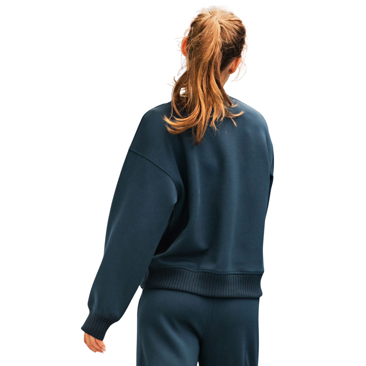 Effortless elegance meets everyday comfort in this Rae Mode Luxe Crew Neck Top. Crafted in a rich navy hue, the long sleeves and timeless crew neckline create a versatile piece perfect for layering or wearing solo. The soft fabric drapes beautifully, making it an essential addition to any wardrobe. Whether you're dressing up or down, this top transitions seamlessly from day to night.