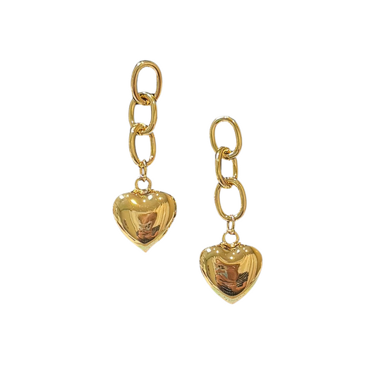 These dangle earrings feature a beautiful heart pendant, crafted from gold dipped material. The elegant chain link design adds a touch of sophistication to any outfit. Elevate your look with these stunning earrings.