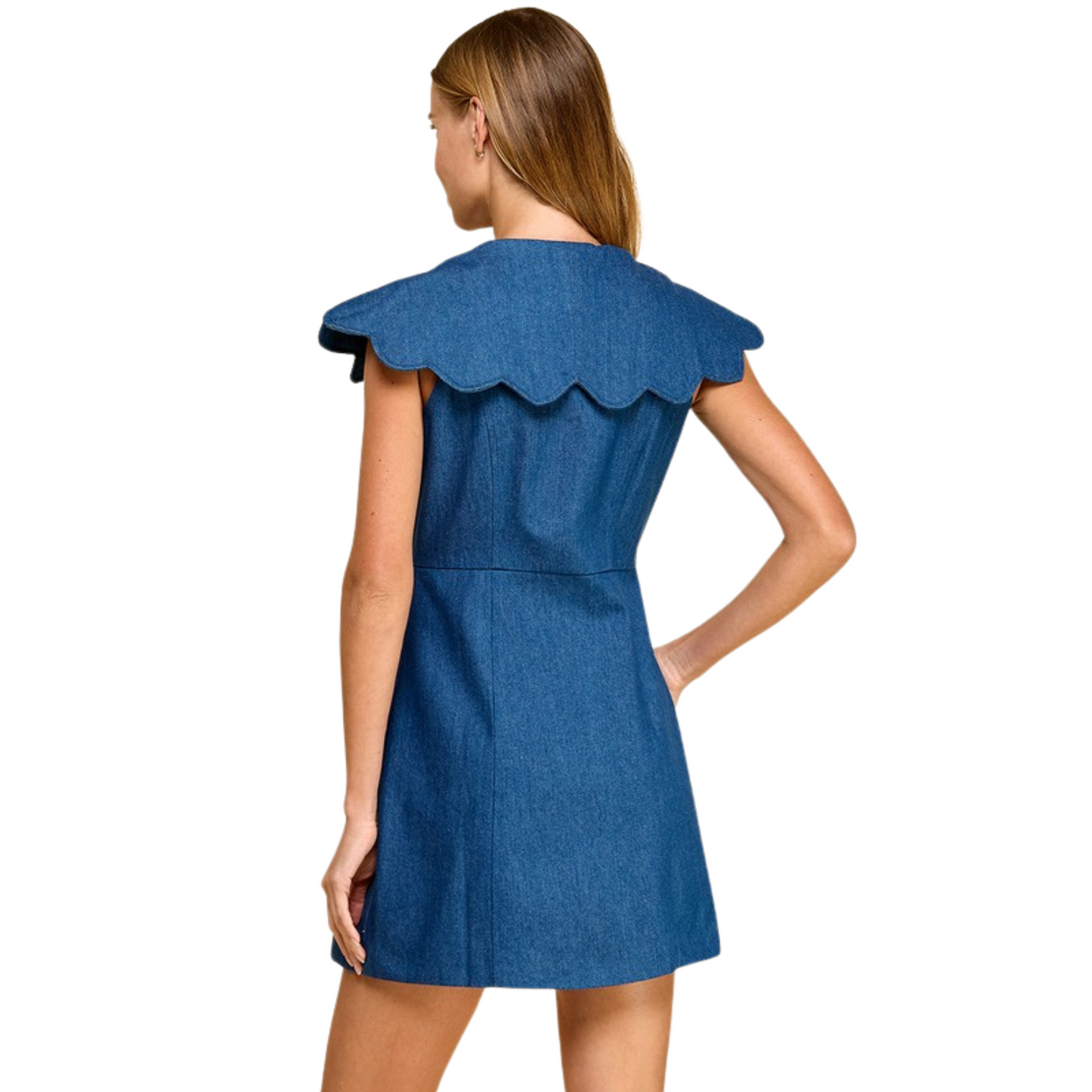 This TCEC mini dress features a refined denim color and a classic button-down front, enhanced by a delicate scalloped collar that adds a subtle feminine touch. Its tailored silhouette offers a polished yet approachable look, perfect for versatile styling from casual outings to more dressed-up occasions. Crafted with attention to detail, this dress combines timeless design with modern elegance.