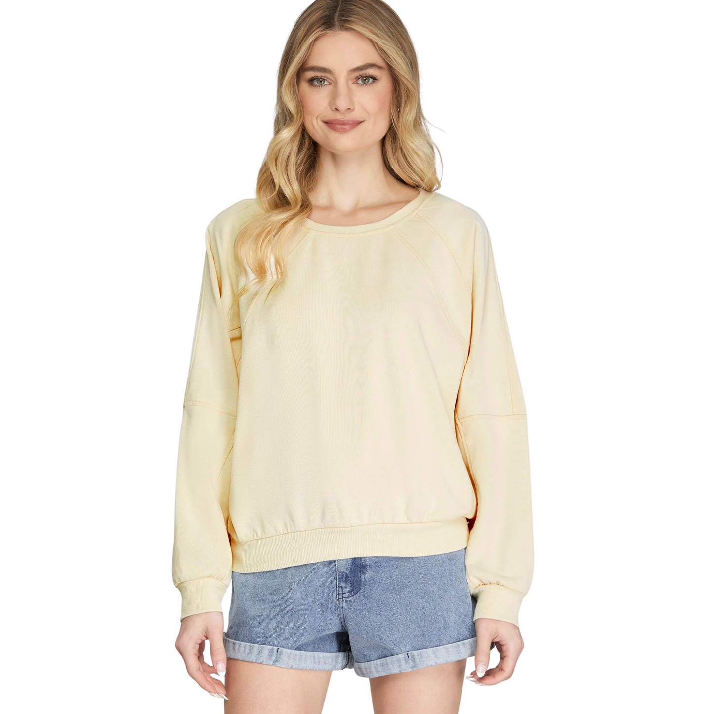 The She+Sky Long Sleeve Dolman Top in cream offers effortless comfort and style. The relaxed dolman sleeves provide a flattering, flowing silhouette perfect for layering or wearing solo. Crafted for everyday wear, this versatile top pairs easily with jeans, leggings, or skirts. The soft, neutral cream color works with any wardrobe, making it a go-to piece for casual outings or relaxed days at home.
