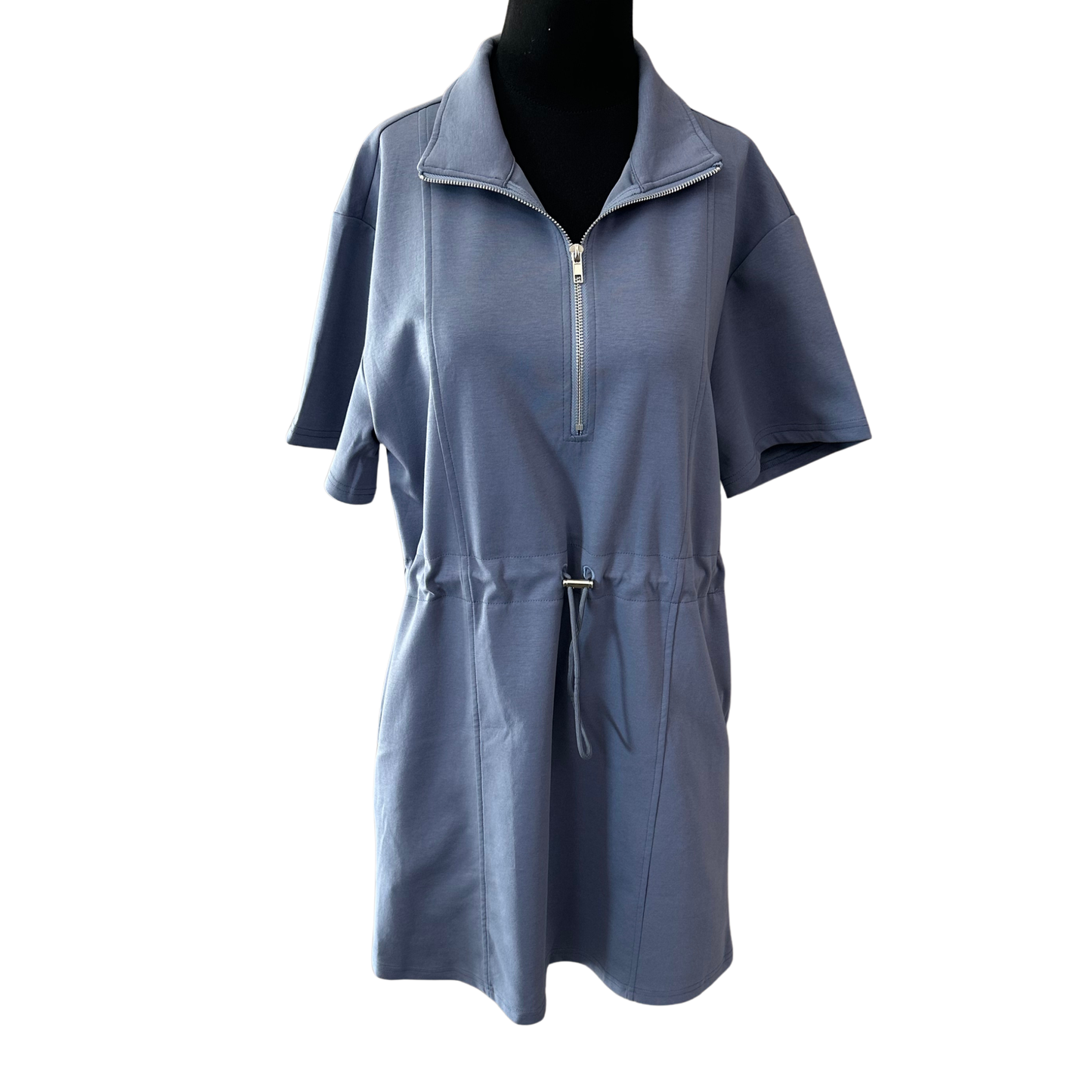 Effortless style meets comfort in this She+Sky mini dress. Crafted from soft scuba knit fabric, it features a collared neckline and half-zip front for easy layering and adjustable coverage. The short sleeves keep things breezy, while the dusty blue hue pairs seamlessly with any wardrobe. Perfect for casual outings, weekend brunches, or relaxed office settings.