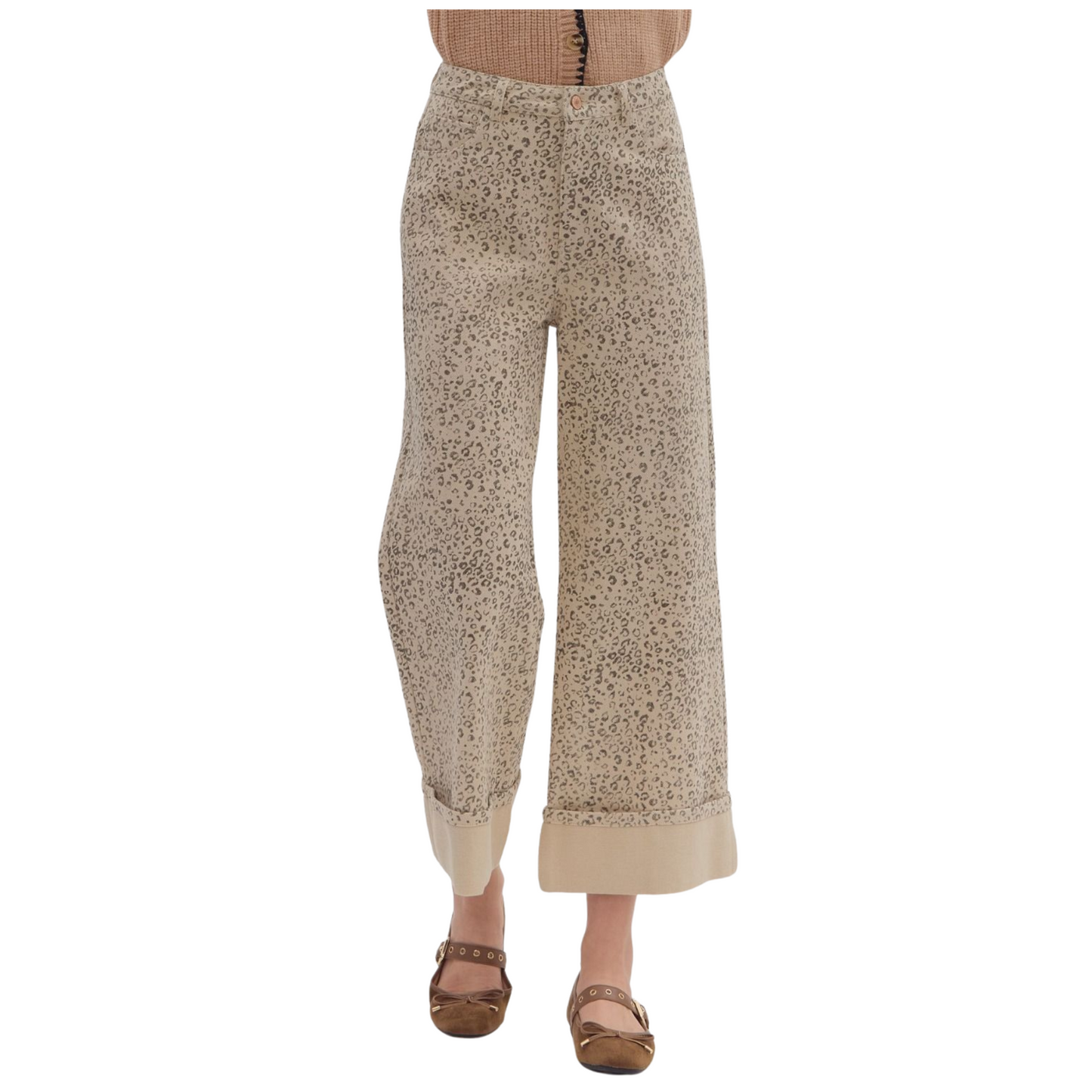 These High Waist Wide Leg Pants from Entro combine style and comfort with a trendy leopard print on a soft ecru background. Designed with a cropped length and a wide hem, they offer a flattering silhouette that balances fashion-forward aesthetics with relaxed wearability. Perfect for elevating your wardrobe with a bold yet sophisticated statement piece.
