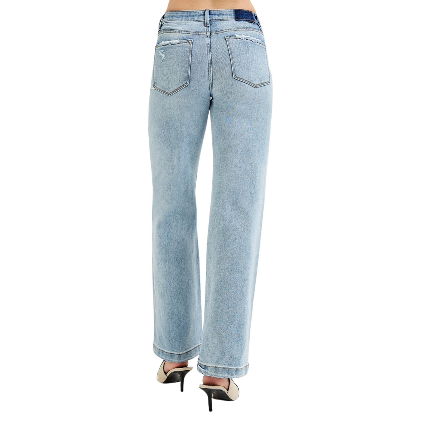 These Elastic Band Mid Rise Jeans from Risen offer a comfortable fit with a wide-leg silhouette and an elastic waistband that adapts to your shape. The light wash finish provides a versatile, modern look suitable for various occasions, combining style with ease of wear. Ideal for those seeking both comfort and contemporary design in their denim collection.