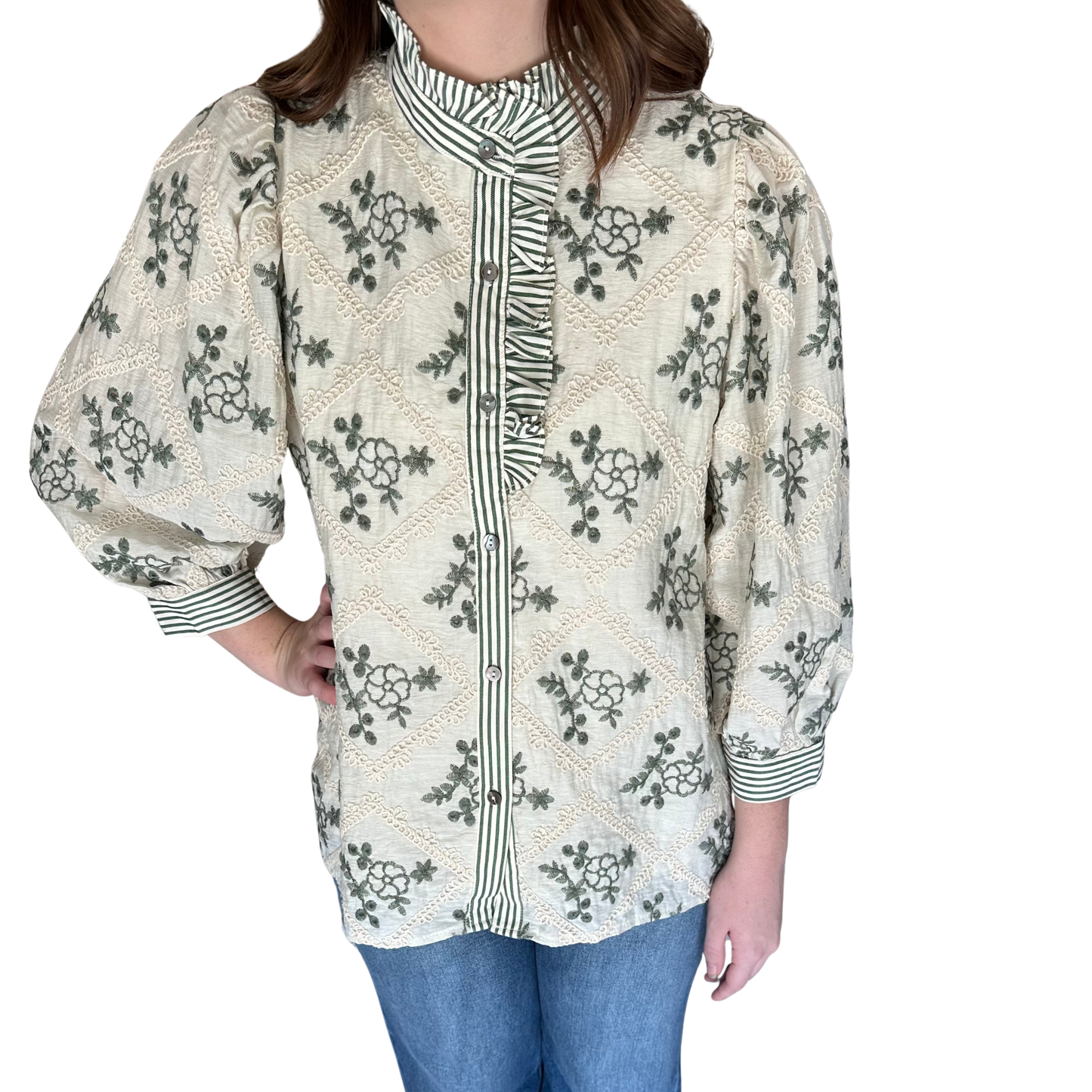 This olive-colored Embroidered Puff Sleeve Top from Entro combines delicate floral embroidery with refined design details. Its 3/4 puff sleeves and contrast striped ruffled collar create an elegant silhouette, while the button-front placket and striped cuffs with button closure add tailored refinement. Crafted from lightweight woven fabric and fully lined, it offers comfortable, non-sheer coverage ideal for polished, versatile styling.