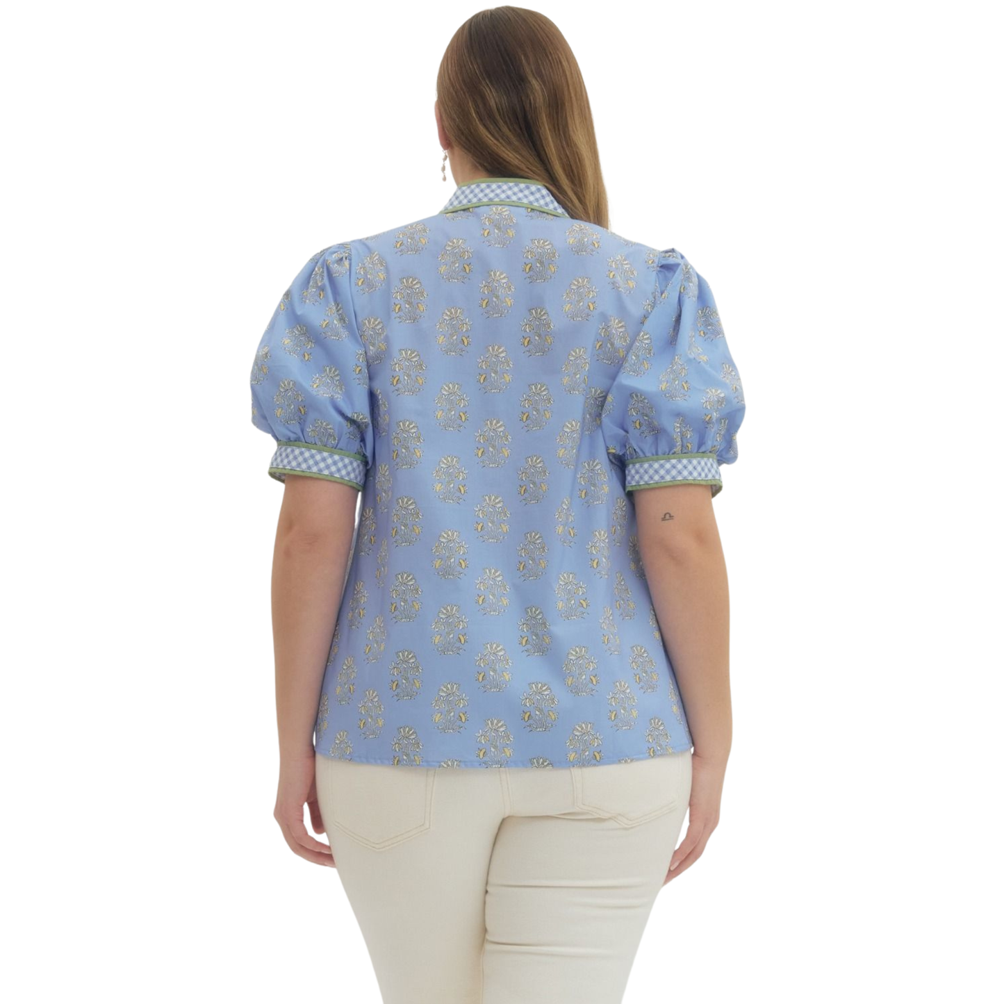 Effortless elegance meets comfort in this stunning Entro floral puff sleeve top. The vibrant blue floral print brings a fresh, feminine touch to your wardrobe, while the flattering V-neckline creates a graceful silhouette. Designed for the modern plus-size woman, the relaxed puff sleeves add movement and style without compromising on wearability. Perfect for casual outings, weekend brunches, or layering with your favorite pieces.