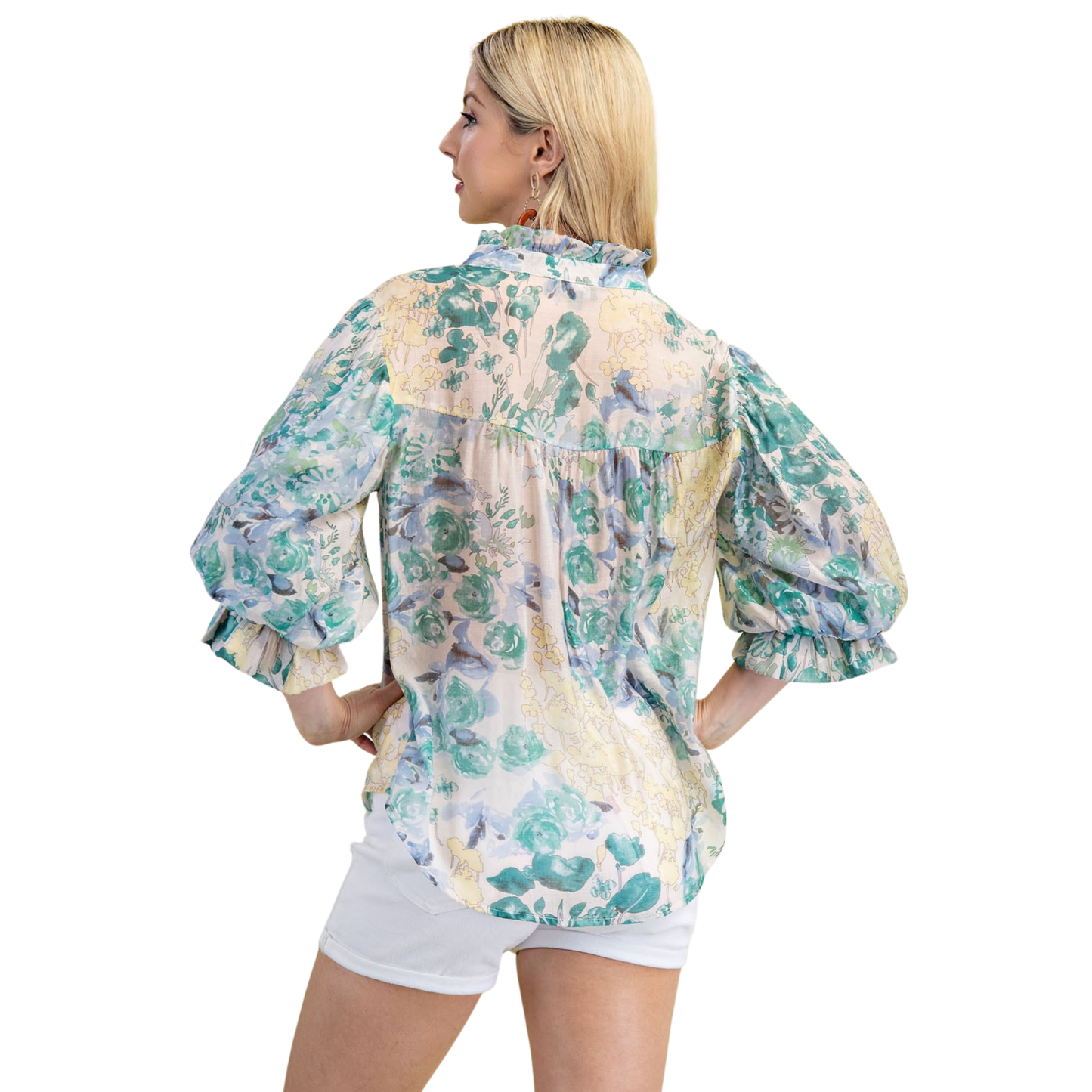 Elevate your wardrobe with this charming GiGio floral button down top. Featuring a vibrant half-sleeve design and delicate floral print, this piece effortlessly transitions from casual days to weekend outings. The classic button-down silhouette offers timeless style with a modern botanical twist. Perfect for layering or wearing solo, this versatile top pairs beautifully with jeans, skirts, or trousers for endless styling possibilities.