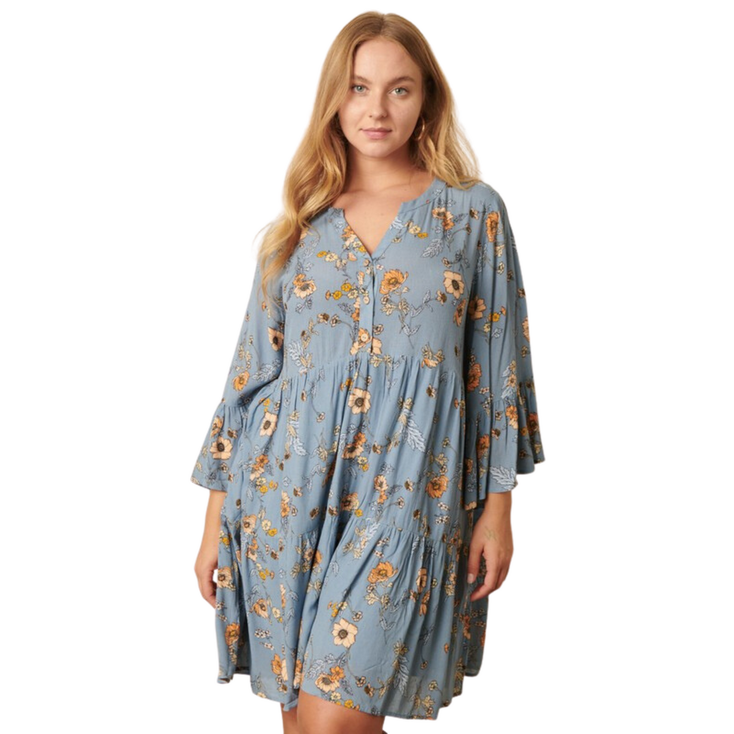 This Flower Print Babydoll Dress is crafted from lightweight Rayon Gauze fabric featuring a delightful flower print in a dusty blue color. The delicate round neckline and slit front with a button closure accentuate a timeless silhouette. With a classic look and a comfortable fit, it’s perfect for any occasion.