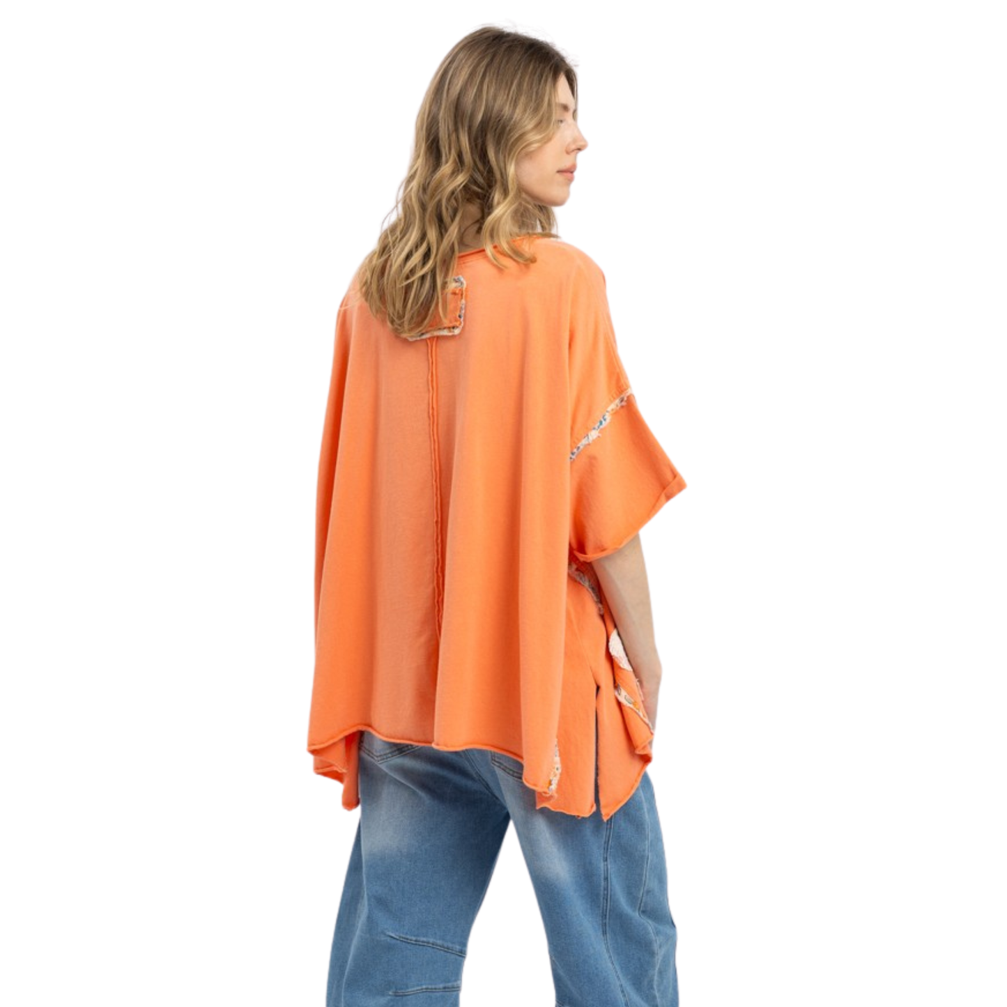Embrace effortless style with this oversized floral patch top from Blue Velvet. Featuring a vibrant coral color and charming flower patch design, this relaxed-fit piece brings a playful, artistic touch to your everyday wardrobe. The generous silhouette offers comfort and movement, perfect for layering or wearing solo. A versatile staple that transitions seamlessly from casual outings to weekend gatherings.