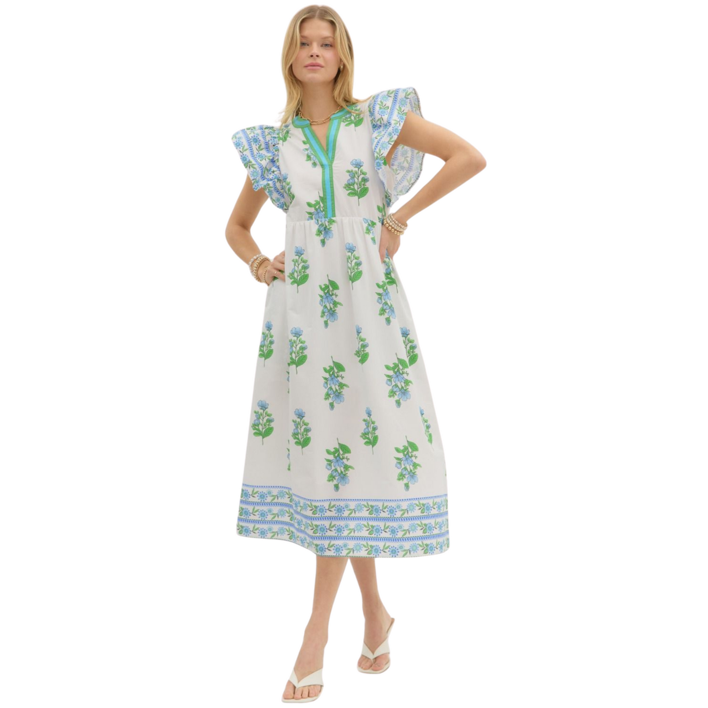 This Entro brand Flutter Sleeve Midi Dress features a floral print framed border pattern with flutter sleeves, a split neck accented by a multicolor band, and side pockets. The dress is lightweight, woven, and non-sheer, and comes lined for added comfort. Perfect for any occasion, its versatile design offers both style and practicality.