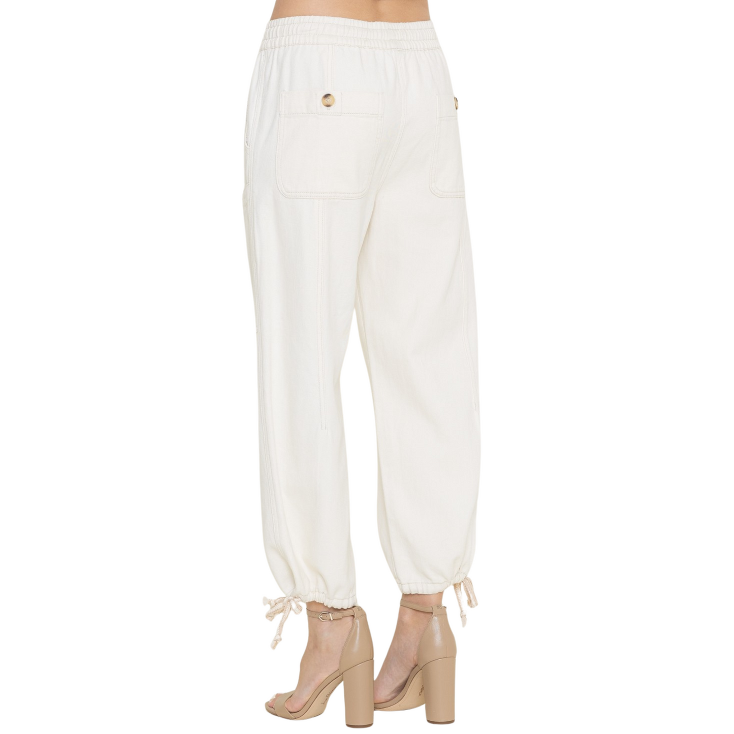 Embrace comfort and style with these ivory Elastic Waistband Casual Pants from the Fore collection. Featuring practical front pockets and a customizable drawstring hem, these pants offer both functionality and a personalized fit. Perfect for casual outings or relaxed days at home, they combine everyday versatility with thoughtful design elements.
