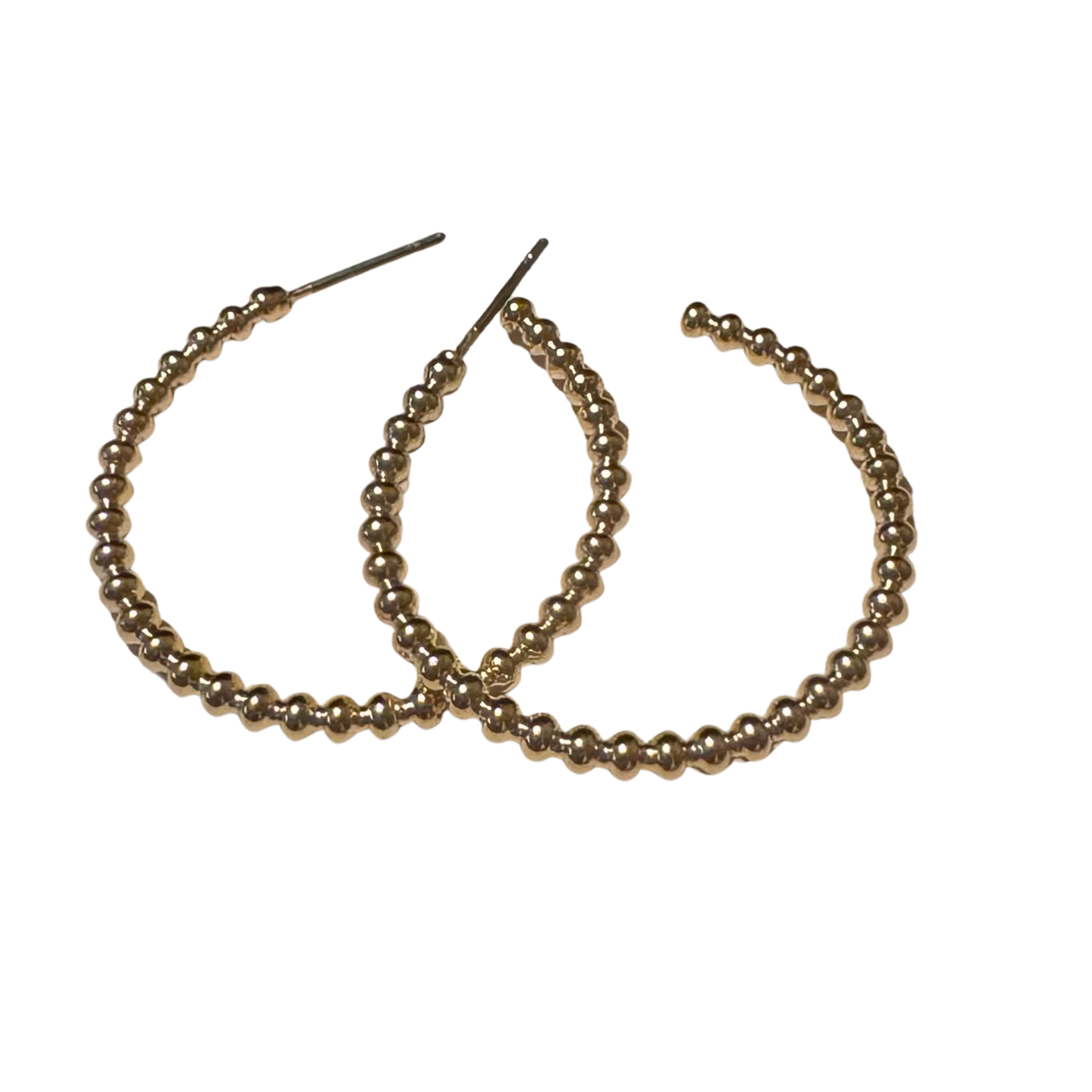 Discover timeless sophistication with Perdido Gems' thin beaded hoops, where minimalist design meets refined craftsmanship. Each hoop features carefully selected beads set along a slender gold band, creating an understated yet striking aesthetic. The lightweight construction ensures all-day comfort, while the versatile style complements both casual and formal occasions.