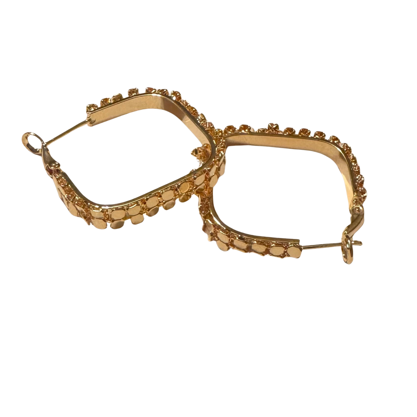 Perdido Gems' square hoop earrings combine geometric precision with timeless elegance. Crafted in gold, these distinctive hoops feature clean lines and a modern silhouette that complements both casual and formal wardrobes. The square design offers a contemporary alternative to traditional round hoops, making a subtle yet confident statement. Perfect for everyday wear or special occasions, these earrings showcase the quality craftsmanship Perdido Gems is known for.