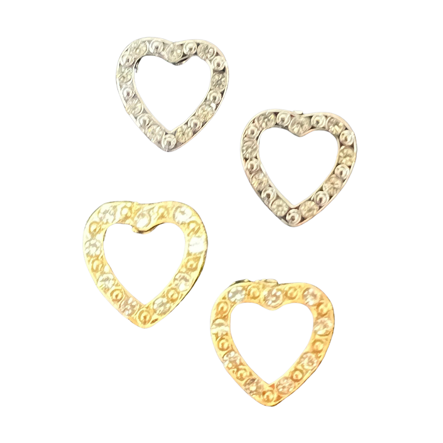 These Heart Stud Earrings are crafted with a classic heart shape and feature a choice of silver or gold colors. Finely finished for a durable and long-lasting look, these earrings will add a touch of elegance to any outfit.