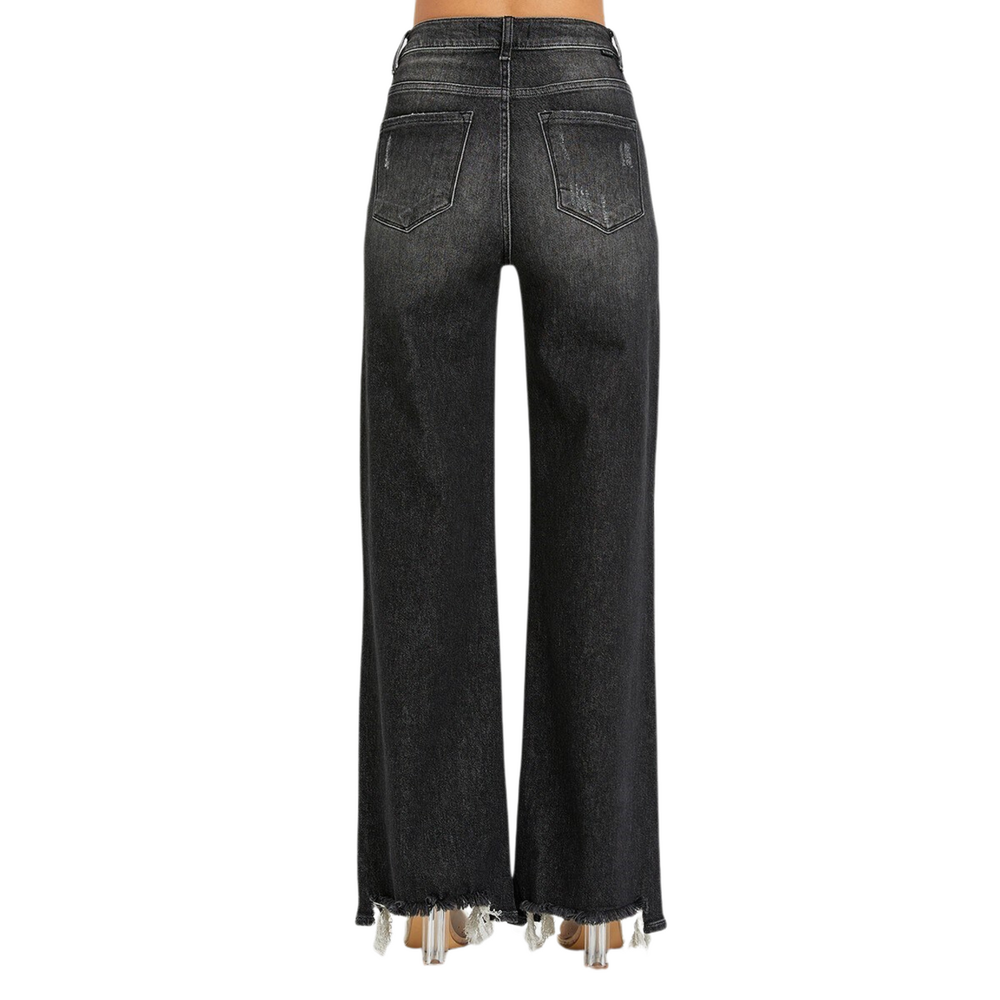 Introducing the High Rise Wide Leg Jeans from Risen Brand. These jeans are crafted with black denim, offering a high rise and wide leg for a comfortable yet classic look. Let your silhouette shine with this timeless denim piece.