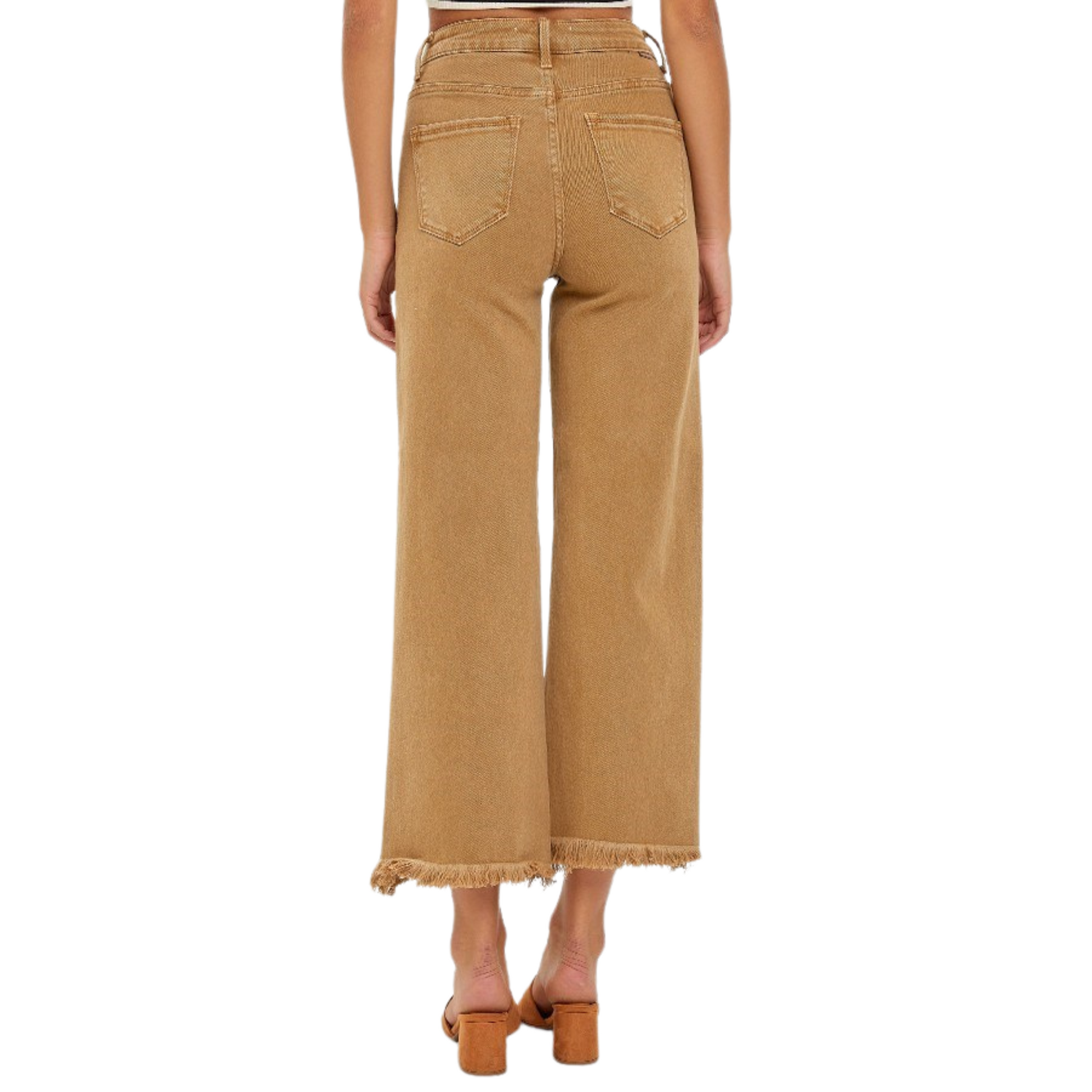 Elevate your style with our Risen High Rise Cropped Wide Leg Jeans. These stylish and versatile jeans are designed with a flattering high rise fit, mocha color, and a trendy cropped length. Perfect for any occasion, these jeans will add a touch of sophistication to your wardrobe.