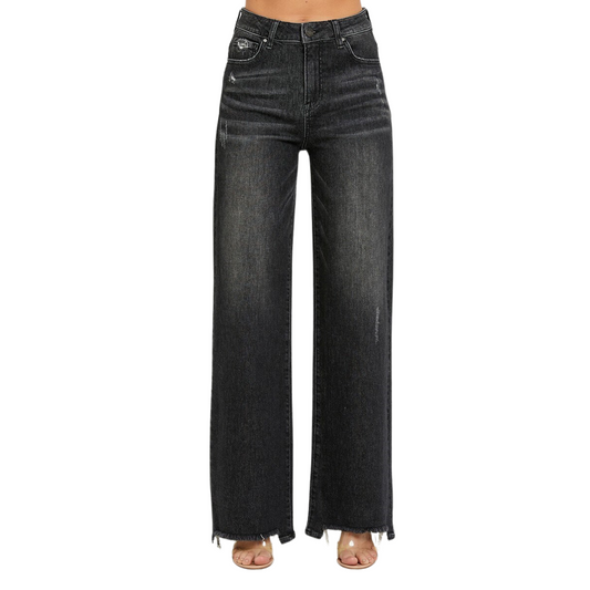 Introducing the High Rise Wide Leg Jeans from Risen Brand. These jeans are crafted with black denim, offering a high rise and wide leg for a comfortable yet classic look. Let your silhouette shine with this timeless denim piece.