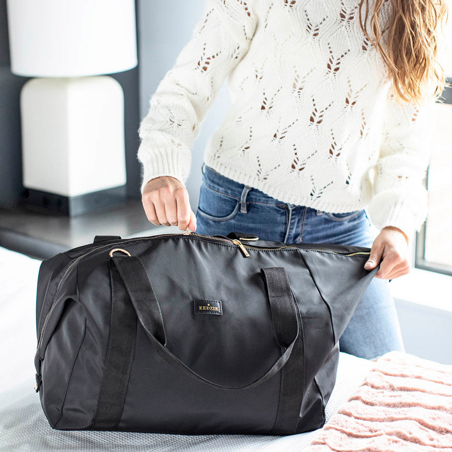 New from Kedzie, a roomy duffle bag with 3-way versatility. Pack this spacious bag completely unsnapped to fit that extra pair of jeans, snap down the sides for more compact packing or fold it down flat to toss in your backpack, luggage, or anywhere else for portable storage that disappears on arrival. Comes with a removable shoulder strap for multiple ways to travel. Mix and match with our Interchangeable Straps!