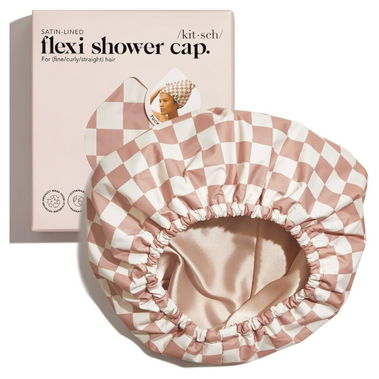 Introducing the Flexi Shower Cap, the must-have accessory for your next shower! Made with a waterproof material and featuring a trendy pink checkered pattern, this cap ensures your hair stays dry and protected. The adjustable design allows for a perfect fit, and with the trusted Kitsch brand, you can shower in style and ease.