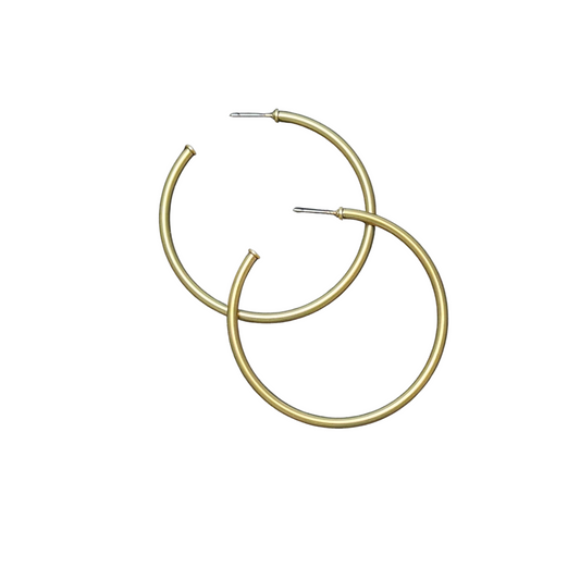 These Large Matte Hoop Earrings by Pomina feature a chic and stylish matte finish that adds a touch of elegance to any outfit. Made with high-quality gold, these large hoop earrings are both durable and fashionable. Elevate your accessory game with these must-have statement earrings.
