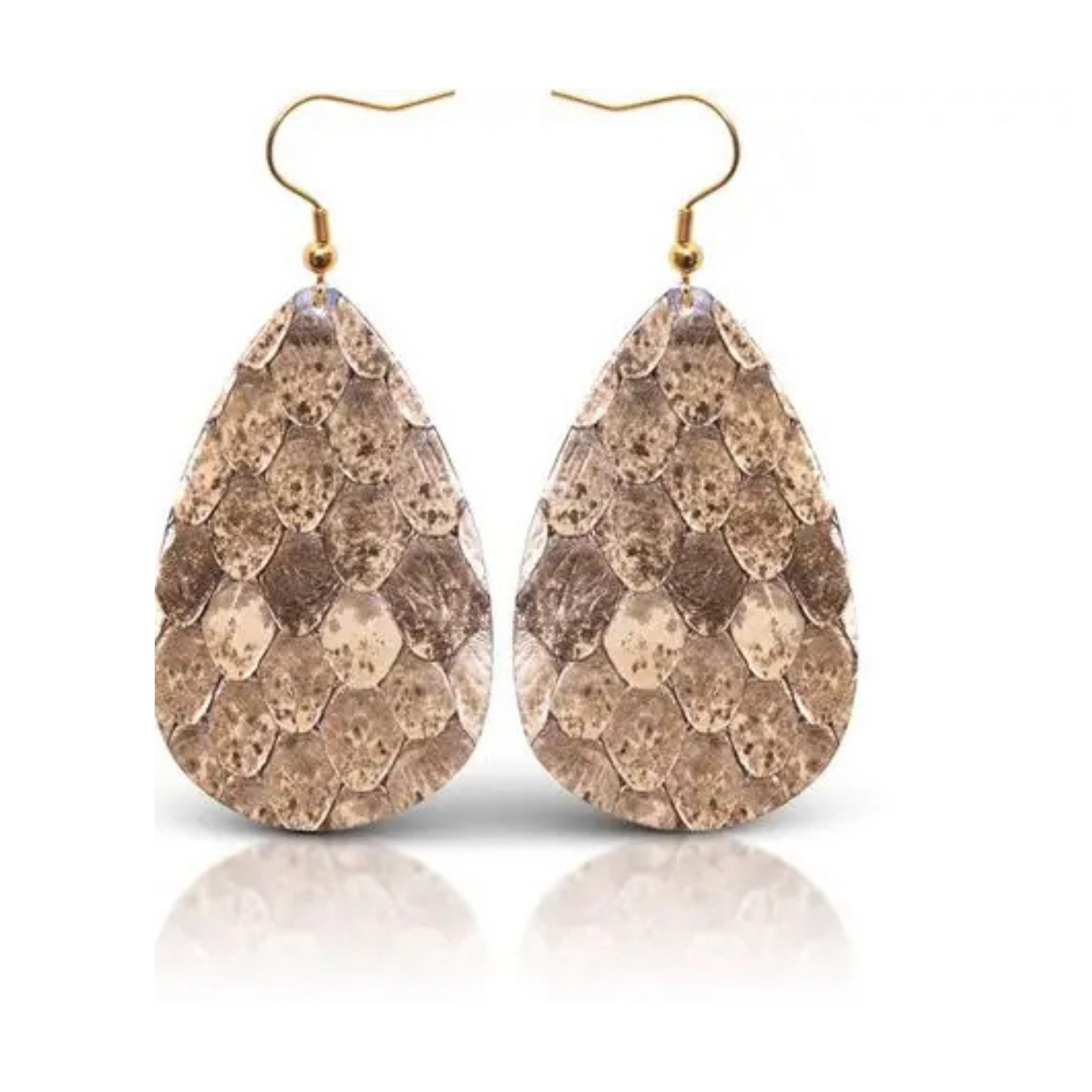 Enhance any outfit with these Small Scale Teardrop Earrings from Amanda Blu. The caramel color, unique small scale design, and teardrop shape make these leather dangle earrings a stylish addition to your jewelry collection. Elevate your look with these high-quality earrings.