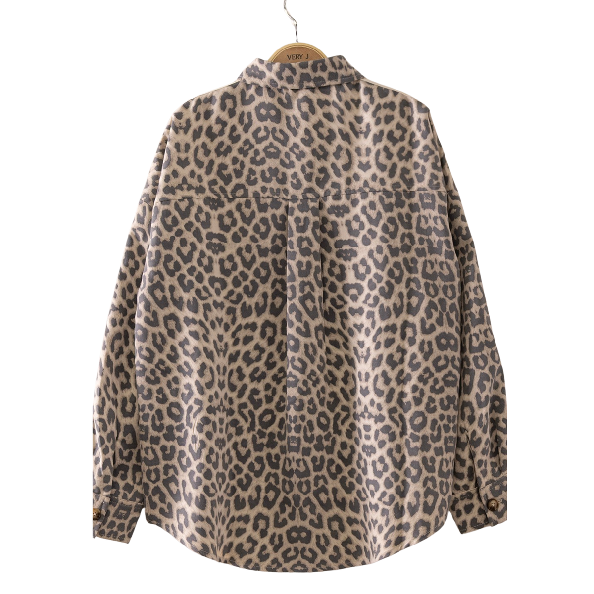 Elevate your casual wardrobe with this cream mix leopard print utility top by Very J. The classic long sleeve button-up design features a structured collar and a flattering fit perfect for layering or wearing solo. The timeless leopard print adds an effortless touch of style to everyday outfits, while the quality construction ensures durability and comfort. A versatile piece that transitions seamlessly from day to night.
