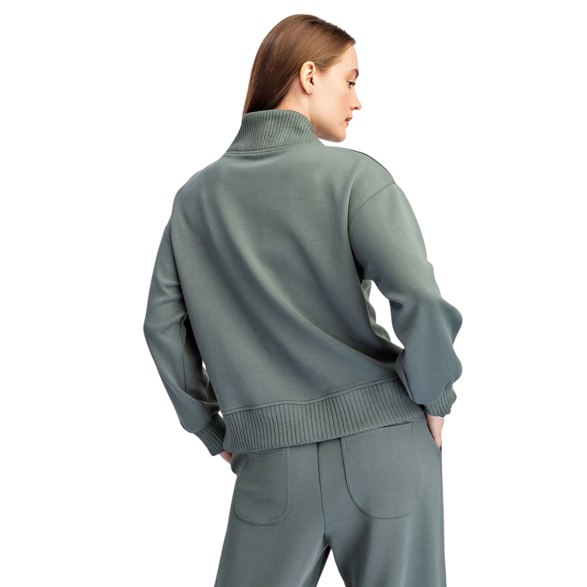 Elevate your everyday wardrobe with this Modal Scuba Luxe V-Neck Top from Rae Mode. Crafted in a sophisticated sage green, this long-sleeve top features a flattering v-neckline and quarter-zip design for versatile styling and easy layering. The luxurious modal fabric offers a soft, breathable feel perfect for all-day comfort. Whether dressed up or down, this timeless piece transitions seamlessly from casual outings to relaxed work settings.