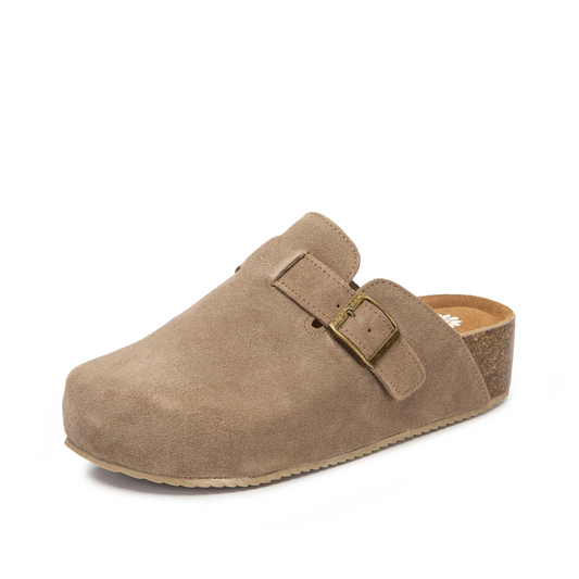 The Maire clog from Yellowbox offers effortless slip-on convenience paired with a versatile dark taupe shade. Designed for easy wear, this clog combines comfort and style, making it an ideal choice for those seeking a practical yet fashionable shoe option.