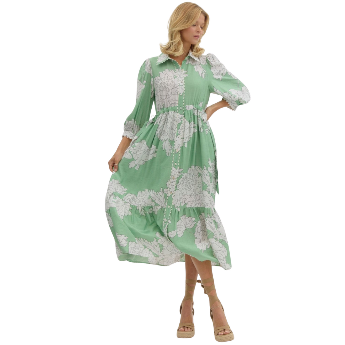 This mint green midi dress from Entro boasts a timeless style with a collared neckline and button-up front. The delicate floral print adds a touch of femininity. Made from high-quality materials, this dress is perfect for any occasion.
