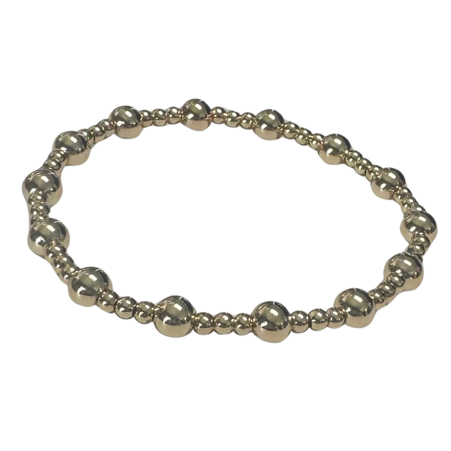 Large and small mixed bead stretchy bracelet in gold